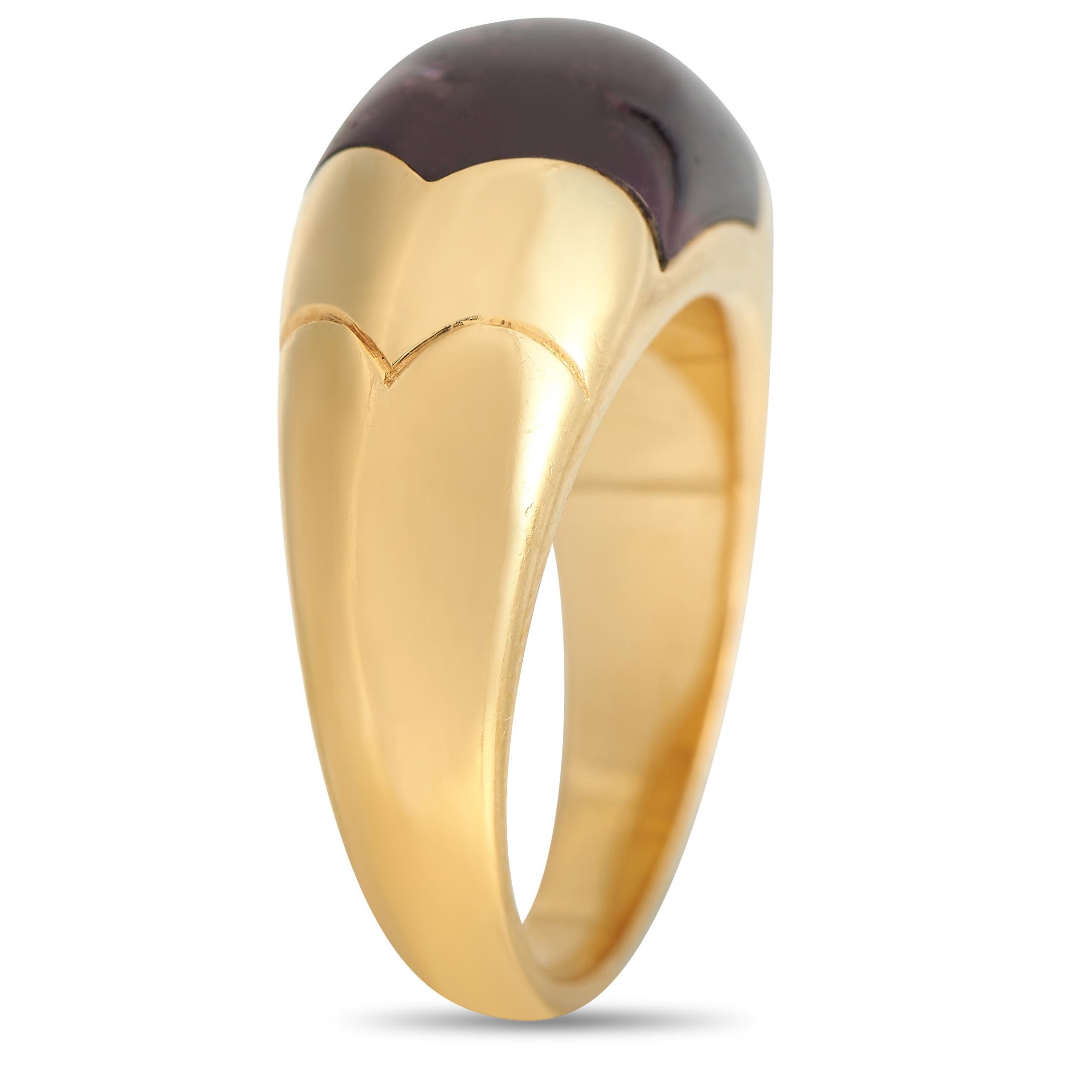 Add a touch of luxury to your everyday style with this Bvlgari Tronchetto 18K Yellow Gold Tourmaline Ring. It features a domed band in solid 18K yellow gold with a deep red tourmaline inlay. The ring's top dimensions measure 6mm by 15mm.This Bvlgari