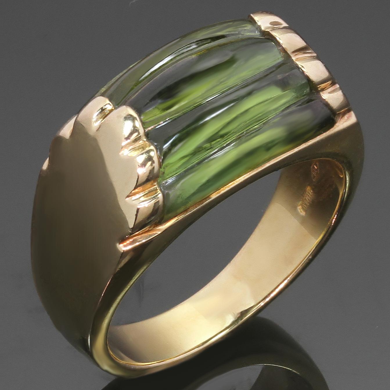 This fabulous Bvlgari ring from the iconic Tronchetto collection is crafted in 18k yellow gold and set with a fluted green tourmaline. Made in Italy circa 1990s. Measurements: 0.70