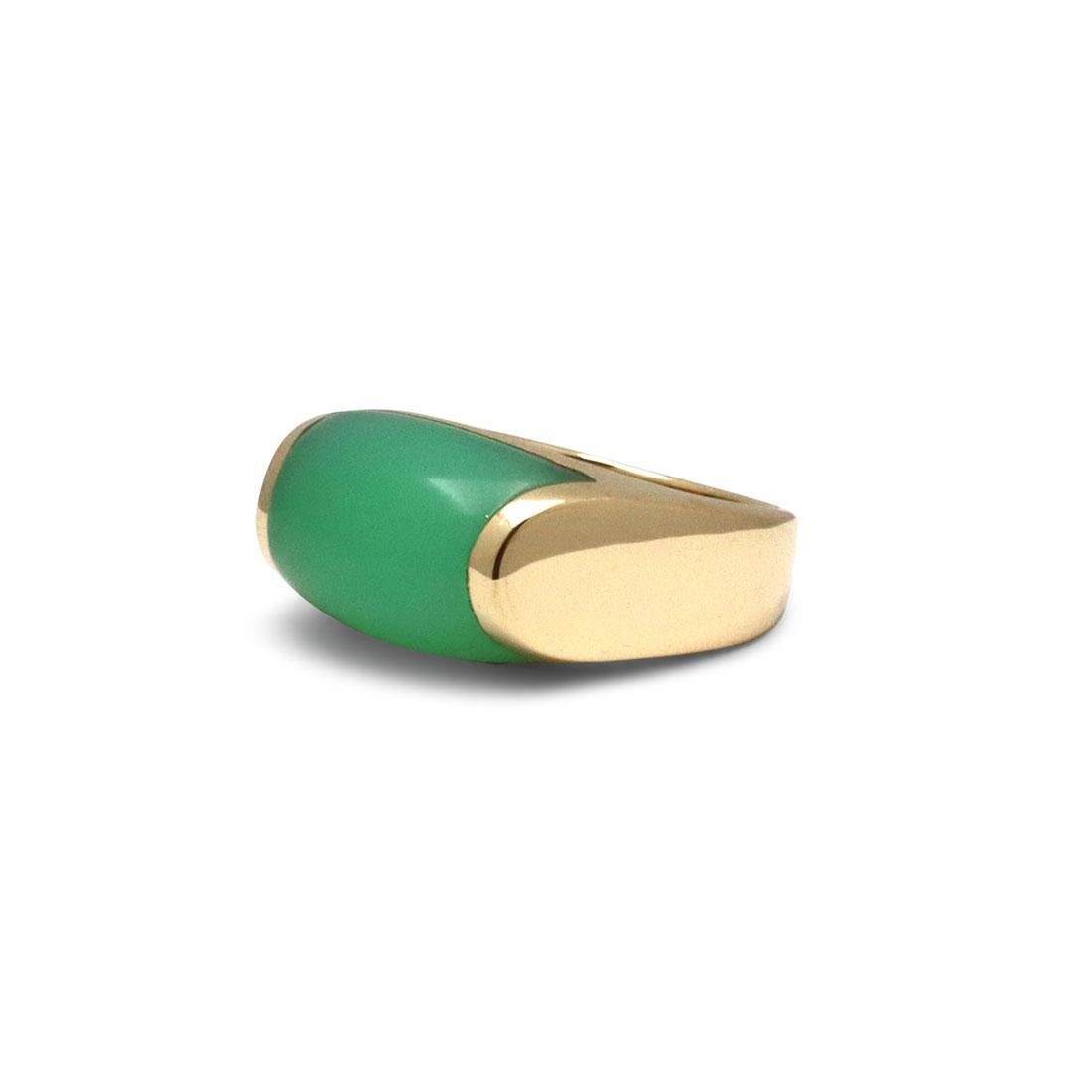 Authentic Bvlgari 'Tronchetto' ring crafted in 18 karat yellow gold features a cabochon chrysoprase stone. The stone measures 9mm in length and 11mm in width. Ring size 4 1/2. Signed Bvlgari, 750 with serial number and hallmarks. The ring is not