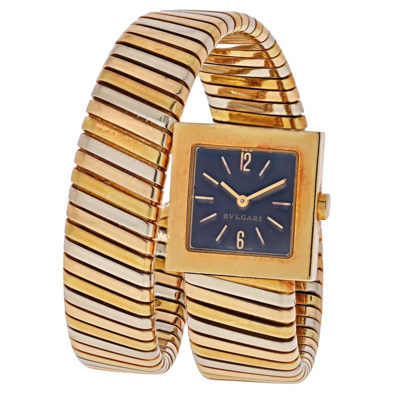 Indulge in timeless luxury with our meticulously crafted Bvlgari Tubogas Vintage Serpenti Wrapped Bracelet Watch, a masterpiece of design and engineering in tri-color gold. This iconic Bvlgari piece showcases the Tubogas Serpenti bracelet, a symbol
