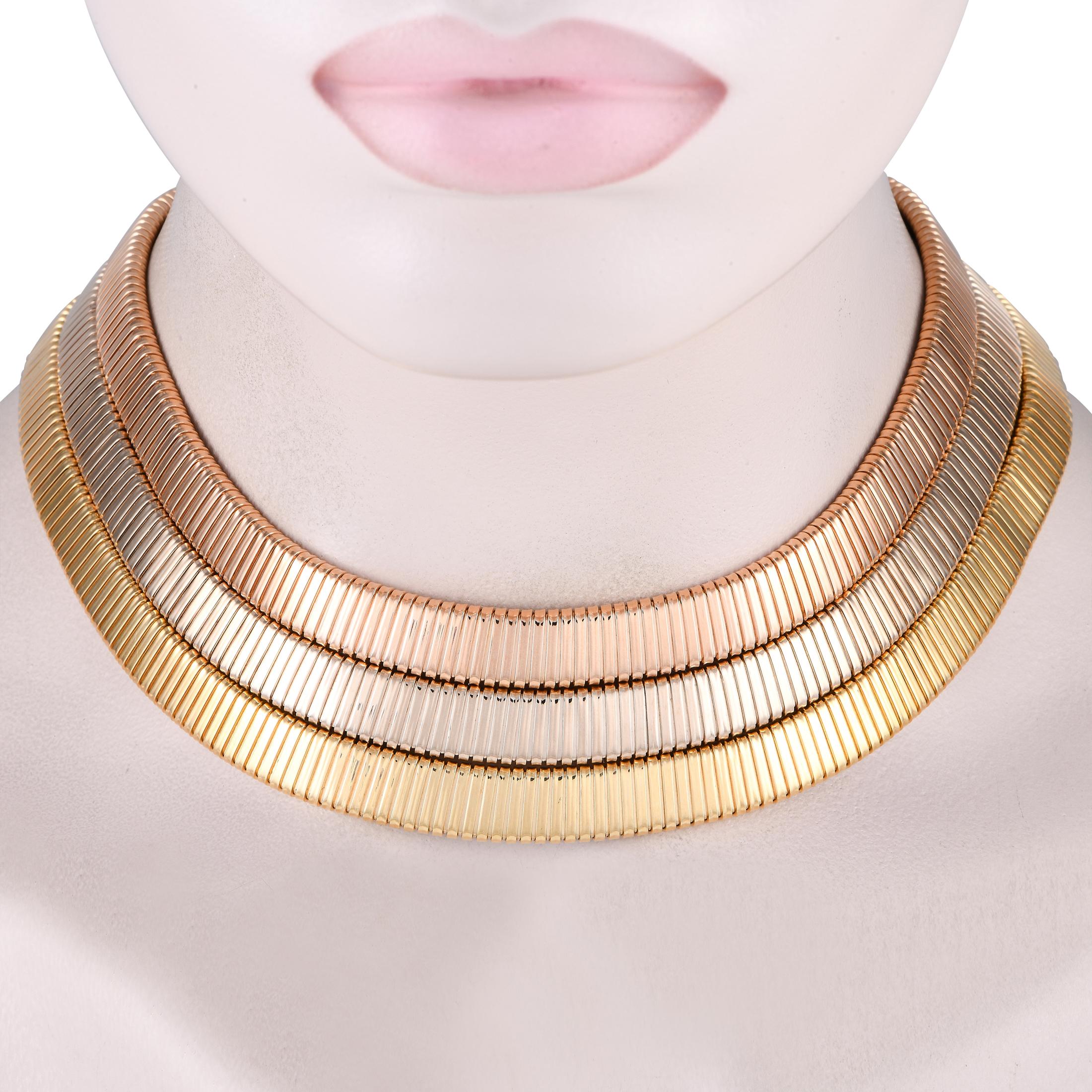 Sleek and sophisticated in design, this Bvlgari Tubogas tri-color gold necklace features a trio of precious metals. Dynamic tones paired with the brands signature construction allow this 13 necklace to put the perfect finishing touch on any