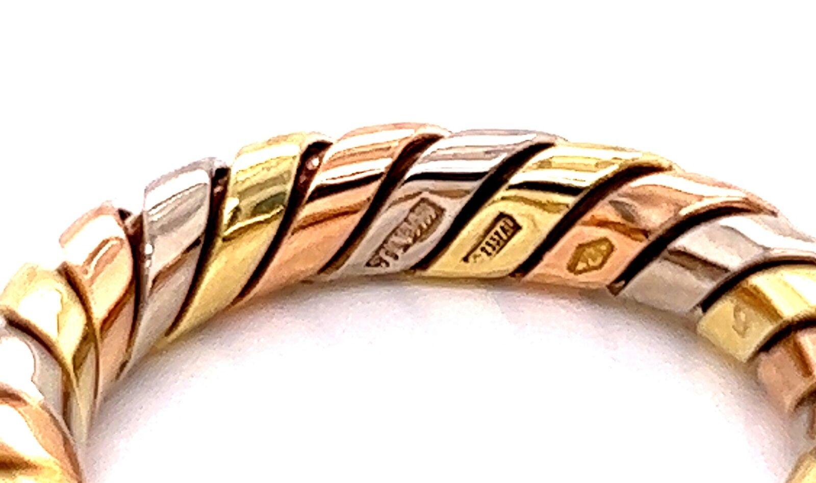 Modern Bvlgari Tubogas 18k Tri Color Gold Band Ring For Sale