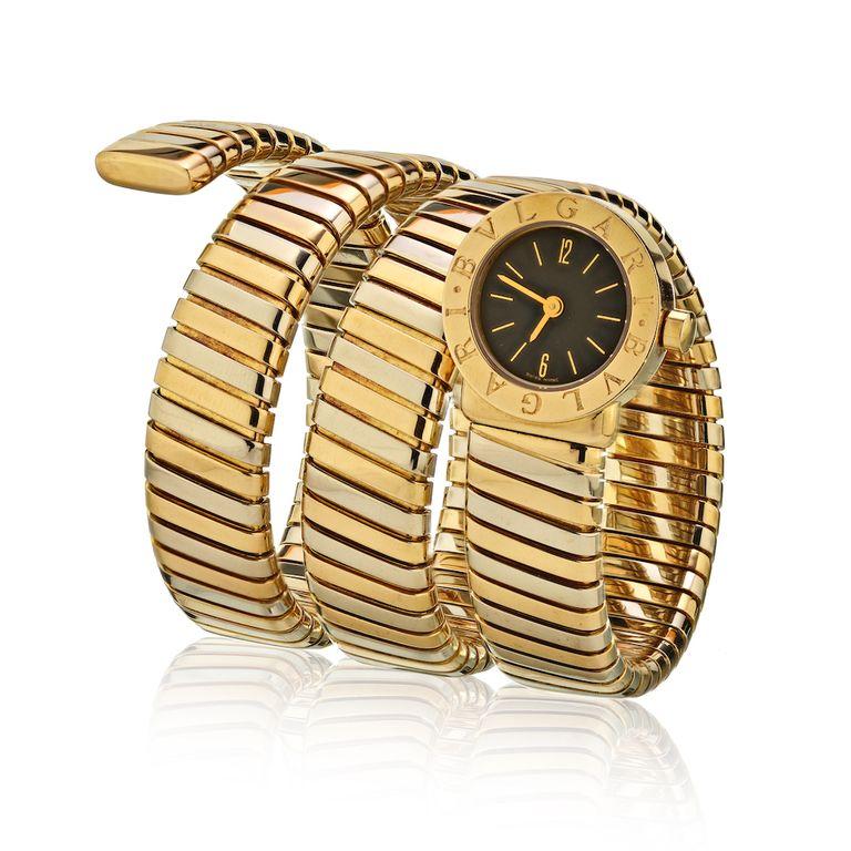 Iconic Timepiece From Bulgari For Women: Tubogas Serpenti. This is a Bulgari-Bulgari Tubogas style that was born in 1980's and it's popularity skyrocketed in the 80's and 90's.
This women's watch is made in 18k yellow, white & rose gold and features