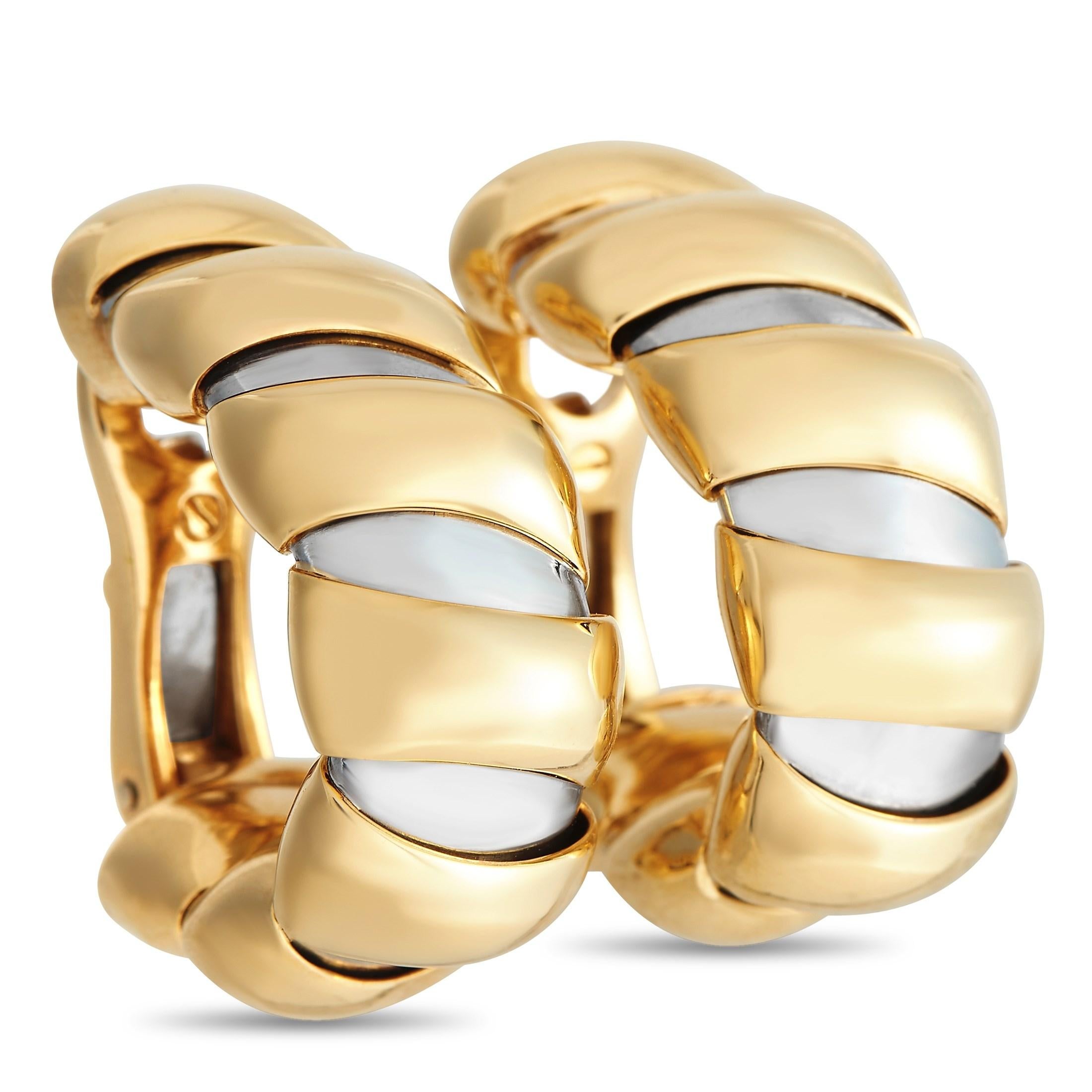 A stunning combination of 18K yellow gold and stainless steel make these Bvlgari Tubogas earrings a subtle accessory that will always make a statement. Each one of these curved earrings measures 0.85” long, 0. 37” wide, and comes complete with