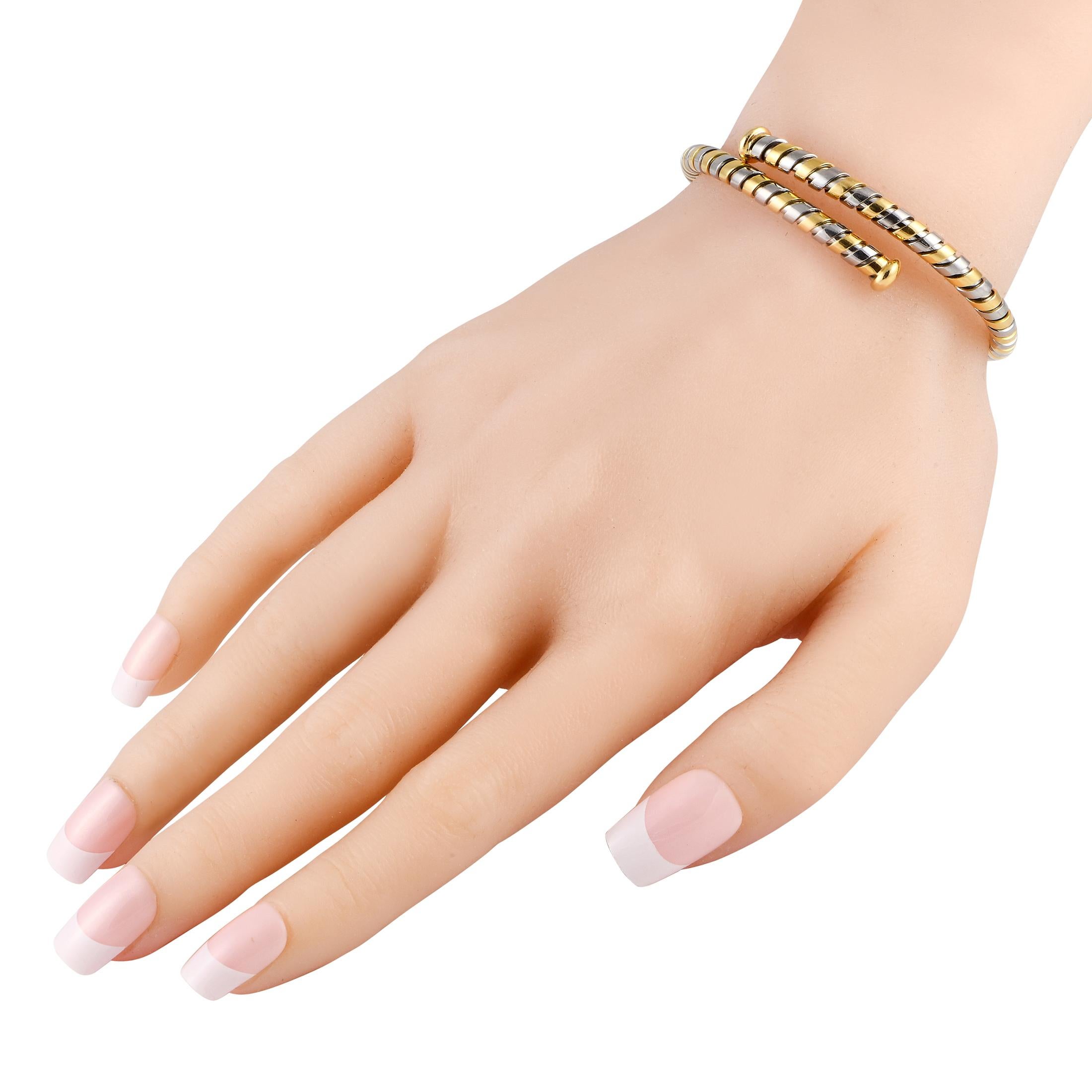 Dies ist ein klassisches Bvlgari-Schmuckstück mit dem charakteristischen Tubogas-Stil. Es ist ein Armreif, der sich um das Handgelenk windet und aus einer Kombination von Edelstahl und 18 Karat Gelbgold besteht. Das Armband misst 6,28 und wiegt 17