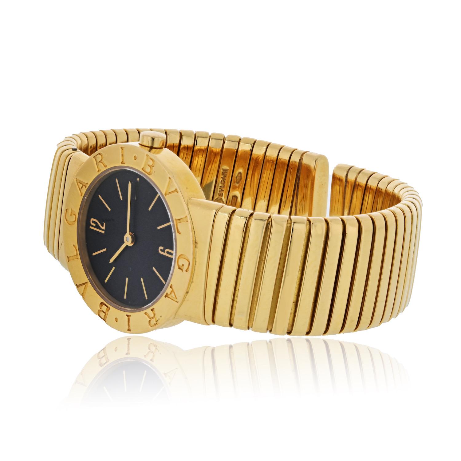 Modern Bvlgari Tubogas 18K Yellow Gold Tubogas 26mm Black Round Dial Watch For Sale