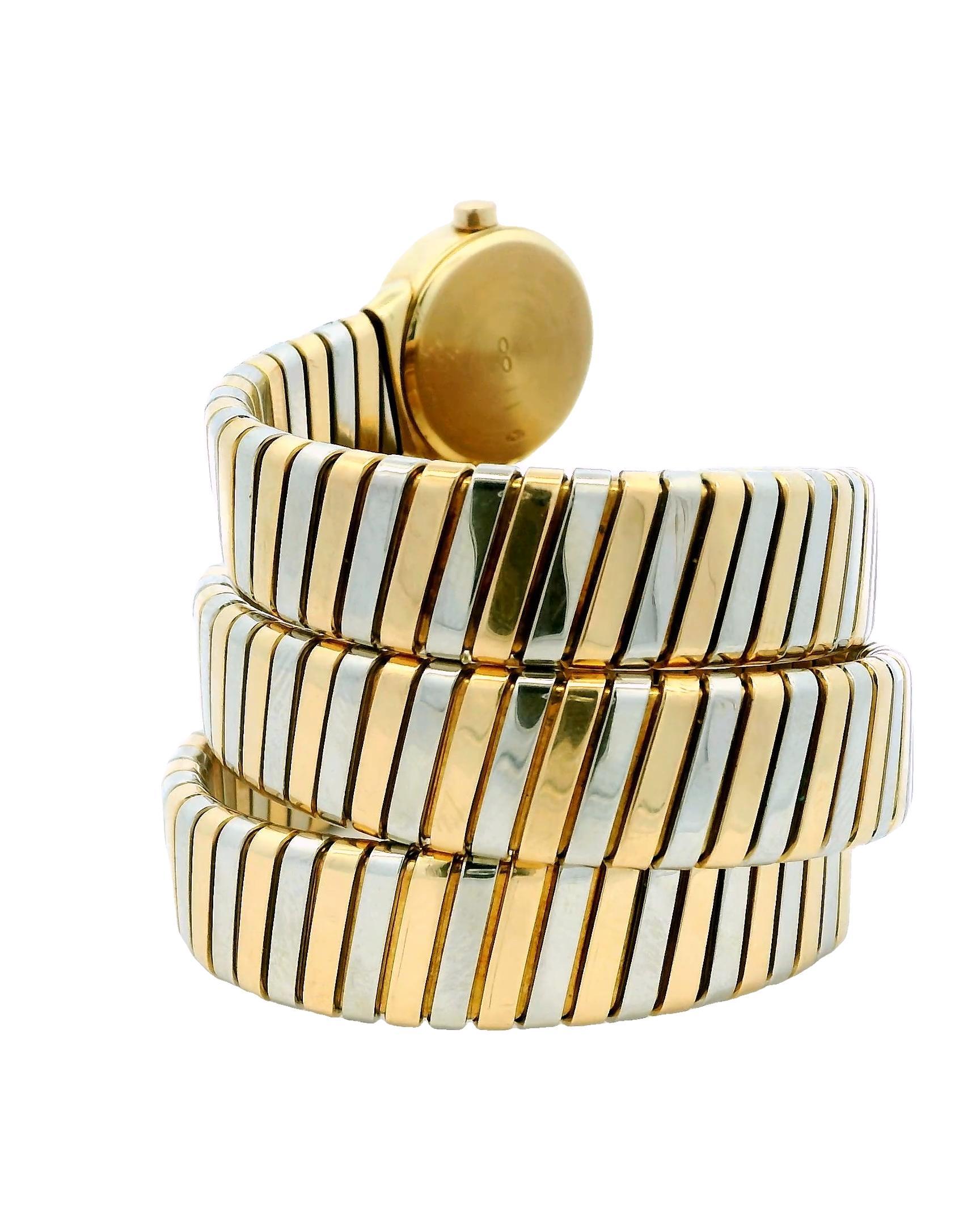 Bvlgari Tubogas Bicolor Ladies' Watch is a stunning timepiece that exemplifies luxury and sophistication. The watch features a 19mm case crafted from 18k yellow gold, which is complemented by a sleek yellow gold bezel. The black dial provides a