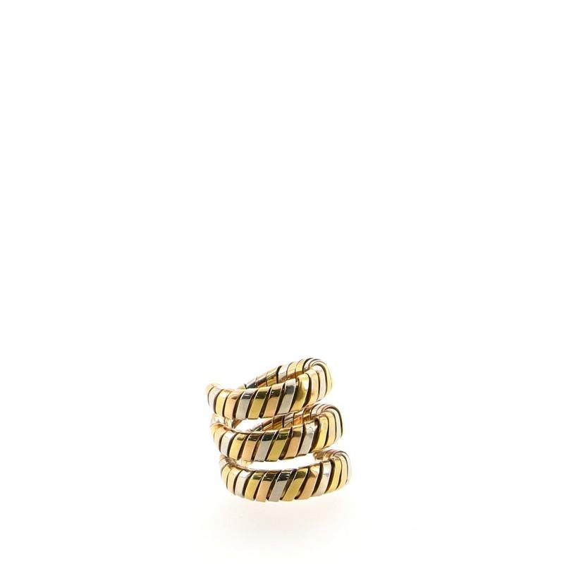 Condition: Fair. Shows heavy wear and has an obscured signature.
Accessories: No Accessories
Measurements: Size: 4.75 - 49, Width: 19.4 mm
Designer: Bvlgari
Model: Tubogas Double Wrap Ring 18K Tricolor Gold
Exterior Material: 18K Yellow Gold, 18K