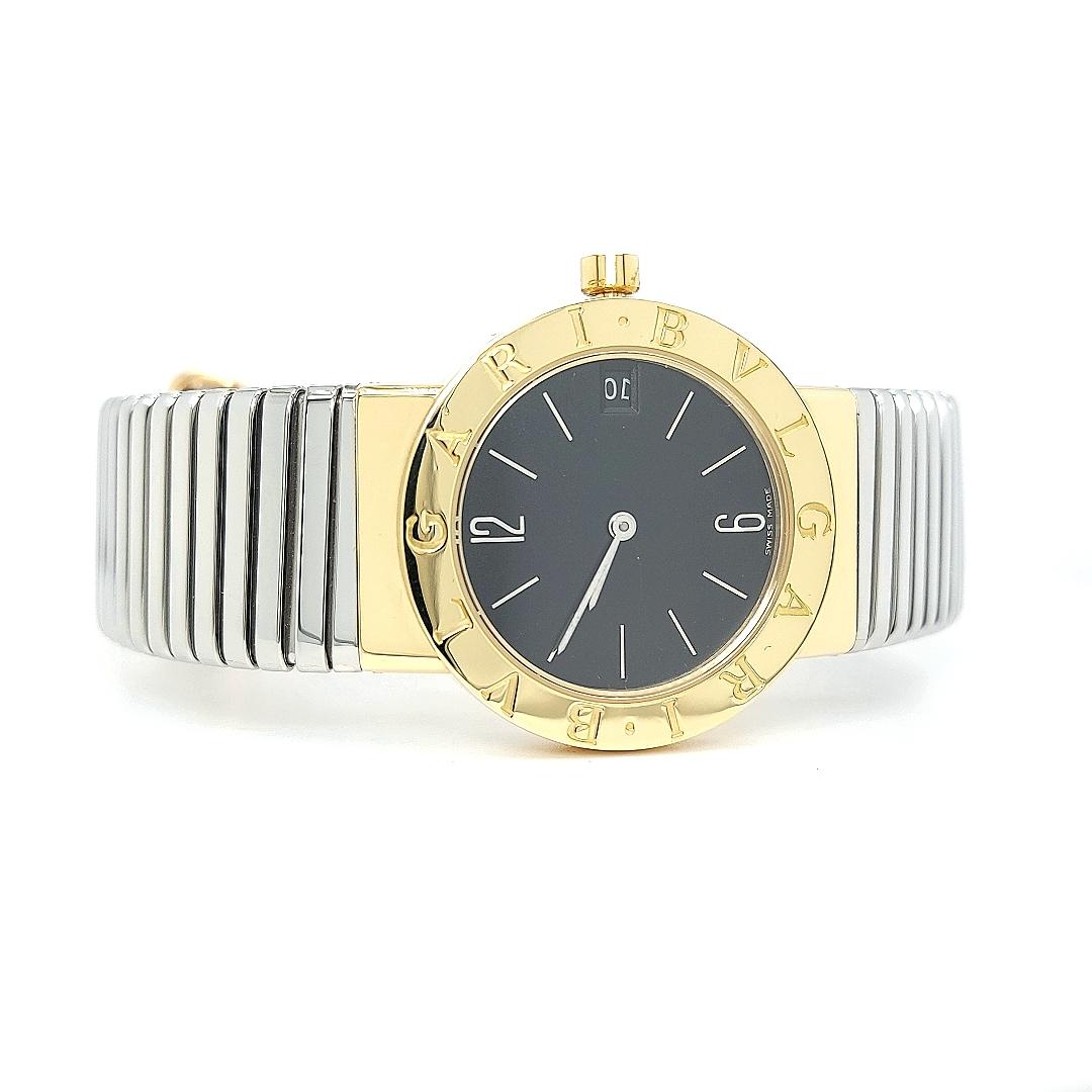 Made as a watch but designed to blend in as an exquisite piece of jewelry, this is a luxurious creation from Bvlgari. 

Condition : Excellent.

The precious case is held by a stainless steel bracelet and solid 18 kt gold watch case  featuring the
