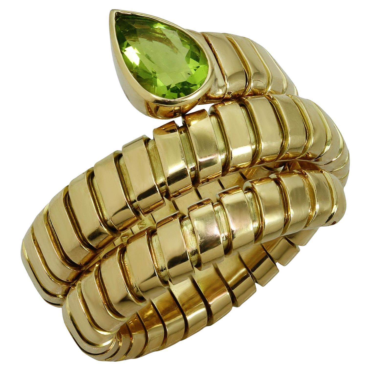 Bvlgari Tubogas Peridot Yellow Gold Wrap Ring For Sale at 1stDibs