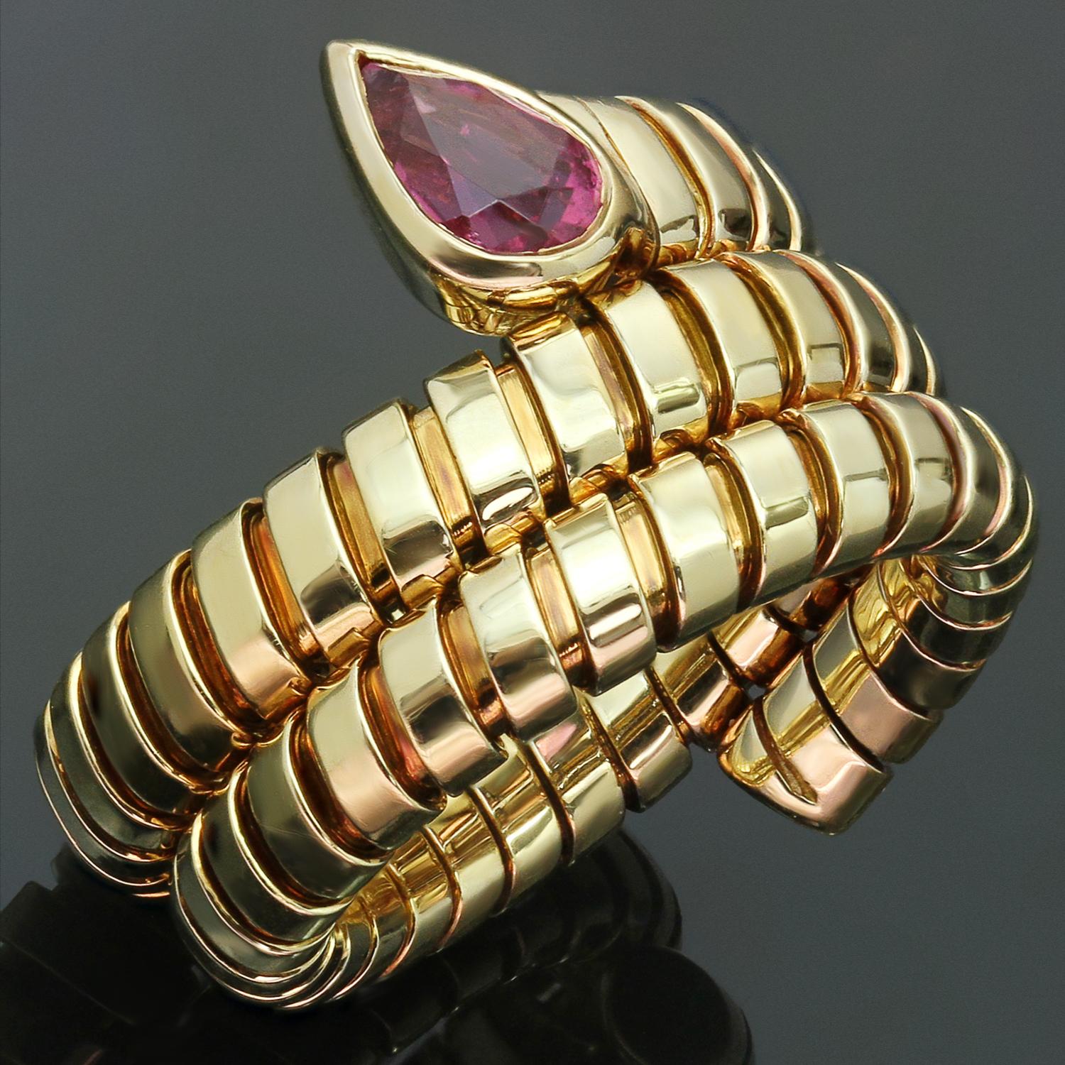 This fabulous Bulgari Serpenti 3-row ring from the iconic Tubogas collection is crafted in 18k yellow gold and set with a pear-cut pink tourmaline. The flex wrap allows the ring size to be slightly adjustable. Made in Italy circa 1990s.