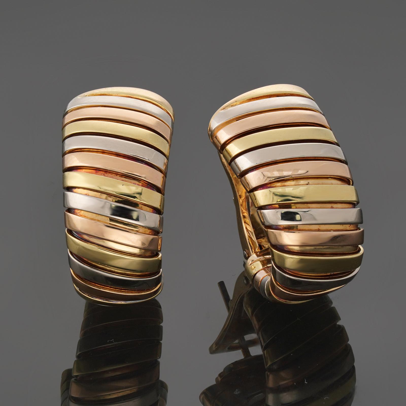 These fabulous Bvlgari clip-on wrap earrings feature the classic Tubogas design crafted in yellow, white, and rose gold. Made in Italy circa 1990s. Measurements: 0.47