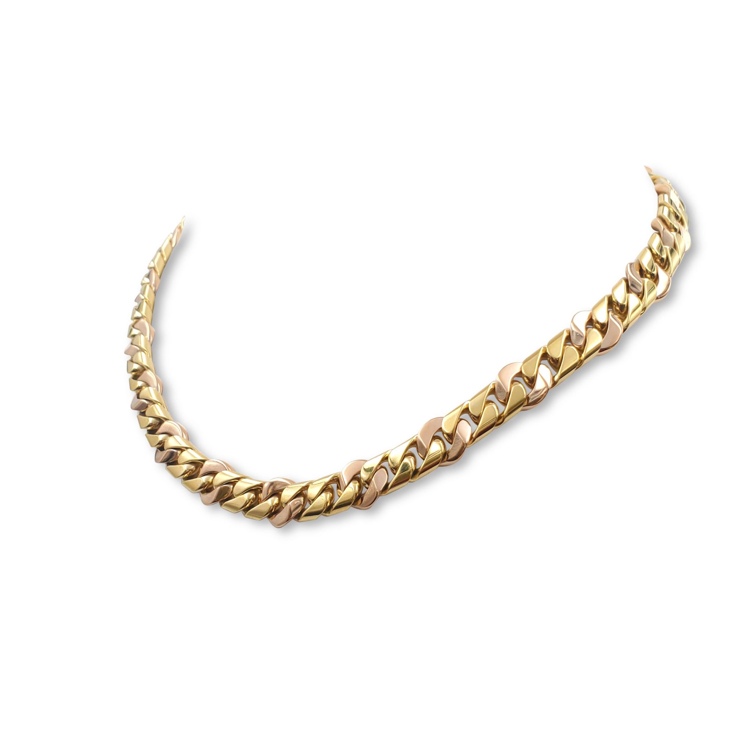 Authentic Bvlgari necklace crafted in 18 karat yellow and rose gold.  Alternating yellow gold rectangular curb links and larger rounded curb links in rose gold are combined here for a stunning effect.  The necklace is 17 inches in total length with