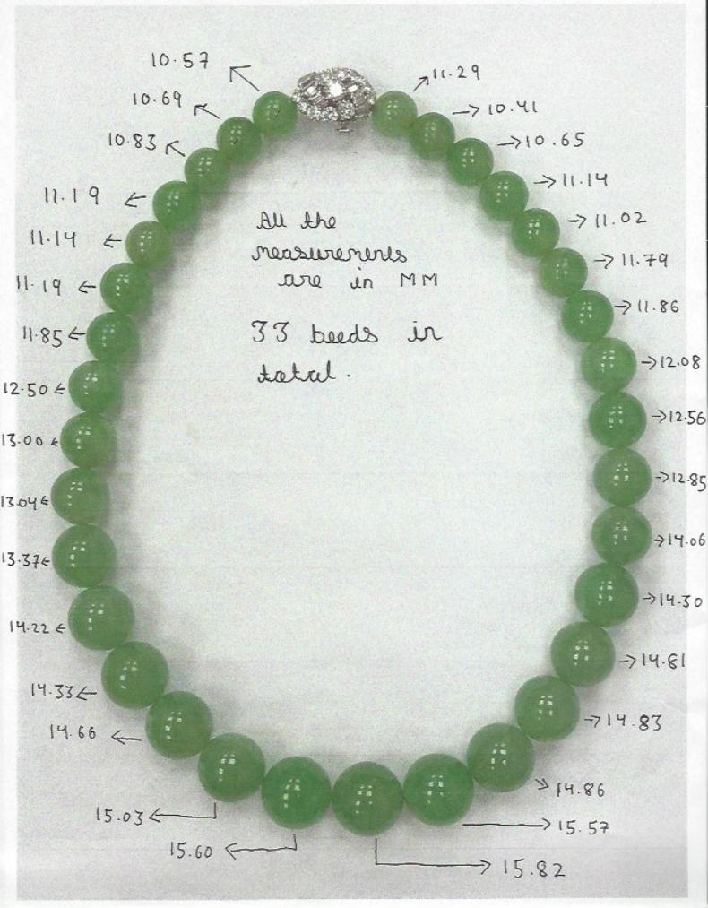 Bvlgari, Very important Large Natural Jade Jadeite and Diamond Necklace 

The single strand comprising thirty-three graduated jadeite beads measuring from 15.8 mm to 10.3 mm, joined to an oval clasp decorated by curved rows of graduated round and