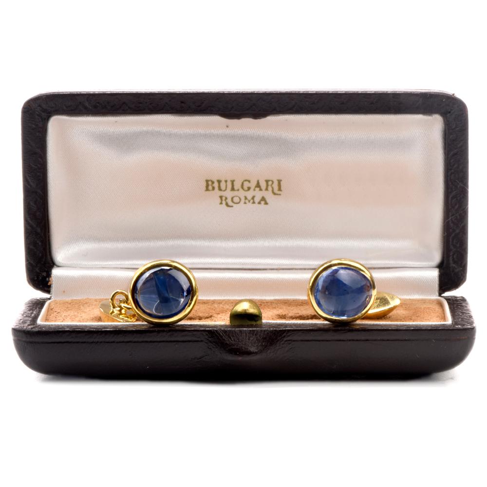 These vintage Bvlgari cufflinks are crafted in 18K yellow gold. The unisex cufflinks are adorned with a pair of genuine natural blue cabochon sapphire, cumulatively weighing approx. 5.35cts. These handsome cufflinks remain in excellent condition. 