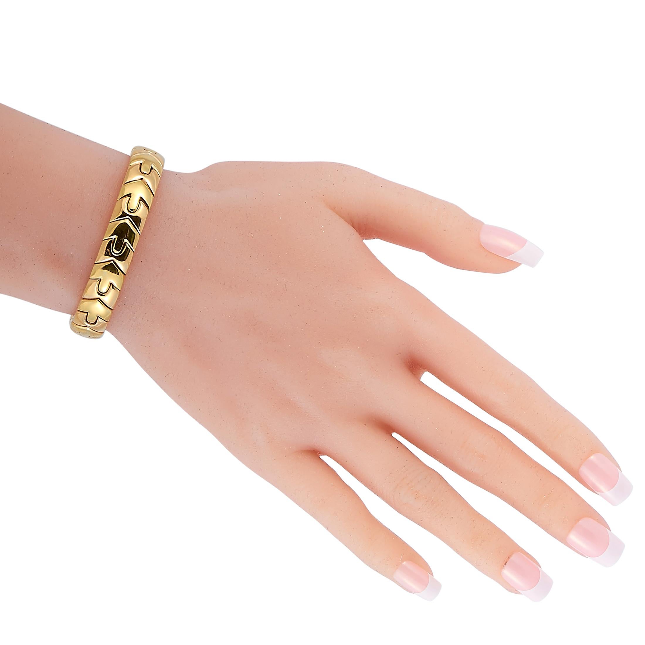 This vintage Bvlgari bracelet is crafted from 18K yellow gold and weighs 60.7 grams, measuring 6.65” in length.

The bracelet is offered in estate condition and includes the manufacturer’s box.