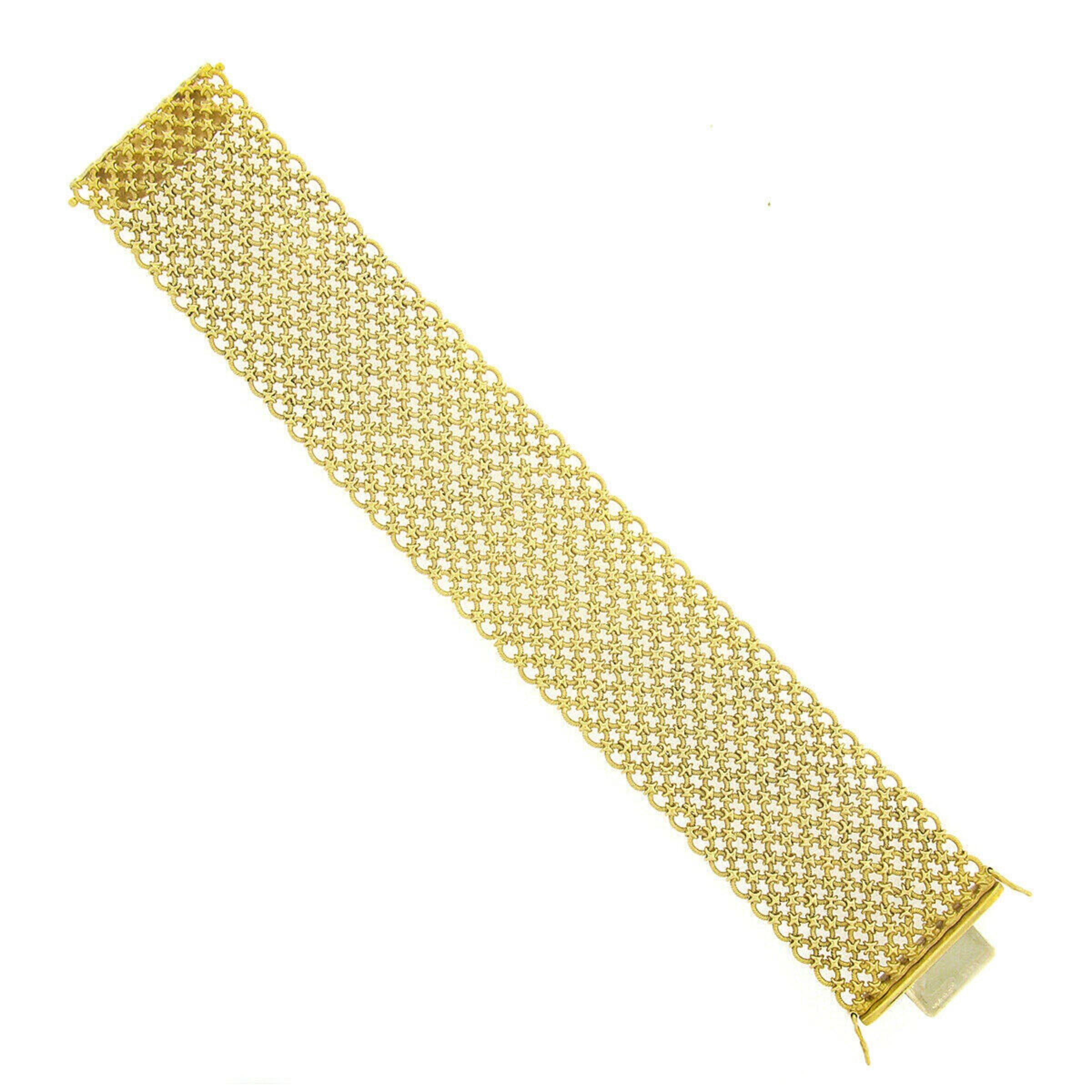 You're looking at a master piece by the Italian luxury brand Bvlgari. This incredibly well made vintage bracelet is crafted in solid 18k yellow gold and features a wide design constructed from textured circular links that are connected throughout
