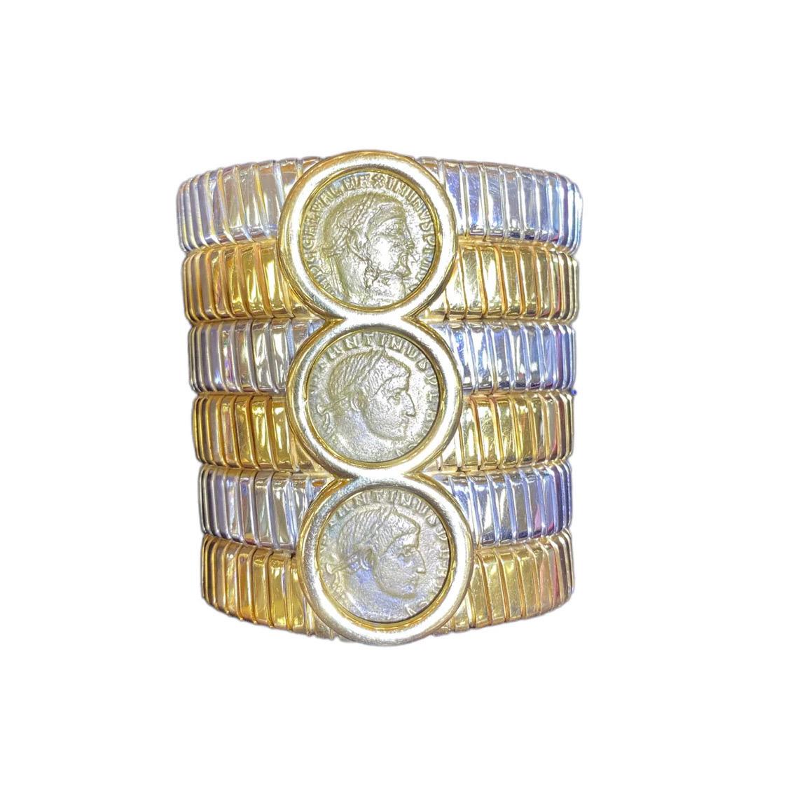 DESIGNER: Bvlgari
MATERIAL: 18k Yellow and White Gold
GEMSTONES: None 
DIMENSIONS: Bracelet will fit approx. 6.75