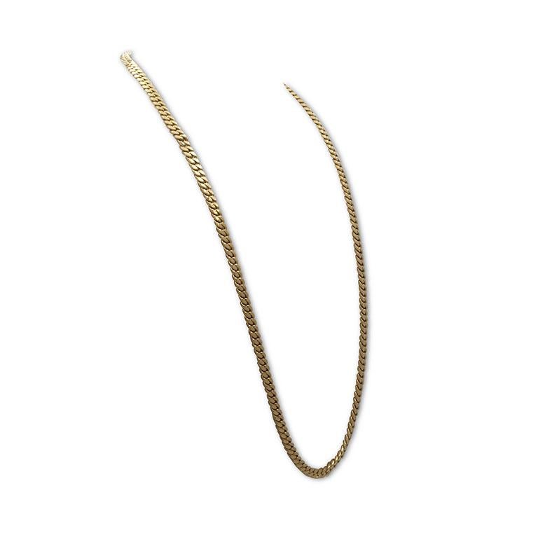 Authentic Vintage Bvlgari necklace crafted in 18 karat yellow gold. The sleek, high-polished curb links measure 6.5mm wide.  This extra-long necklace measures 35 1/2 inches in length with a push box closure.  Signed Bulgari, Italy, 18K.  Not