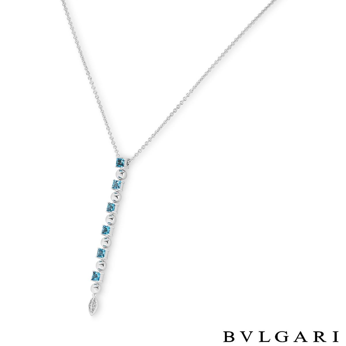 An elegant 18k white gold aquamarine and diamond drop pendant by Bvlgari from the Lucea collection. The pendant is composed of 6 square sugarloaf cut aquamarines alternating with 6 spherical motifs that lead down to a diamond set marquise motif. The