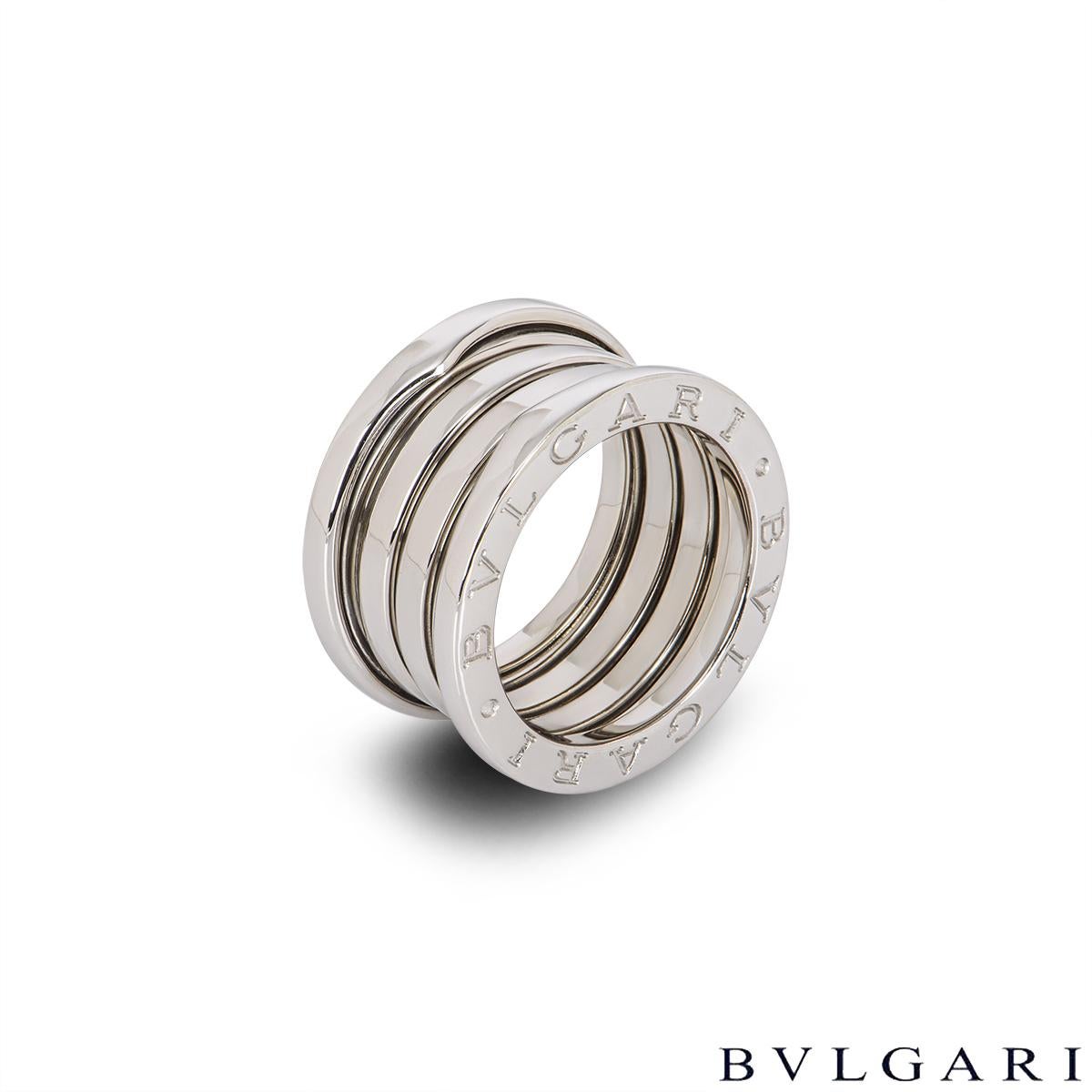 A classic 18k white gold ring by Bvlgari from the B.Zero1 collection. The ring comprises of 3 spiral design bands with the iconic 'Bvlgari Bvlgari' logo engraved around the outer edges. The ring is a size UK K - EU 50 and has a gross weight of 11.5