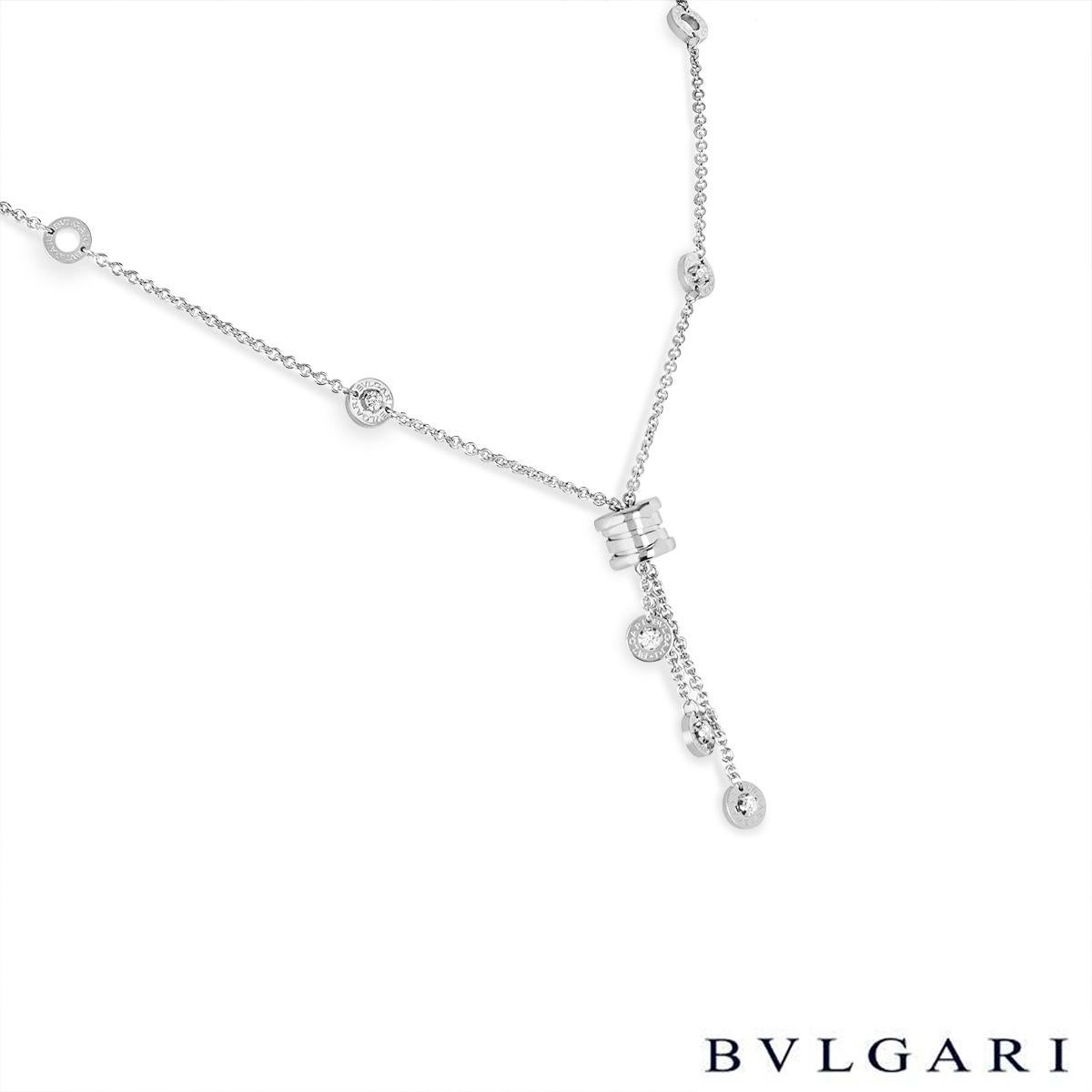A luxurious 18k white gold Bvlgari diamond necklace from the B.Zero1 collection. The necklace comprises of the iconic B.Zero1 motif with 3 tassels hanging freely. Each tassel has a circular motif at the end with a round brilliant cut diamond set to