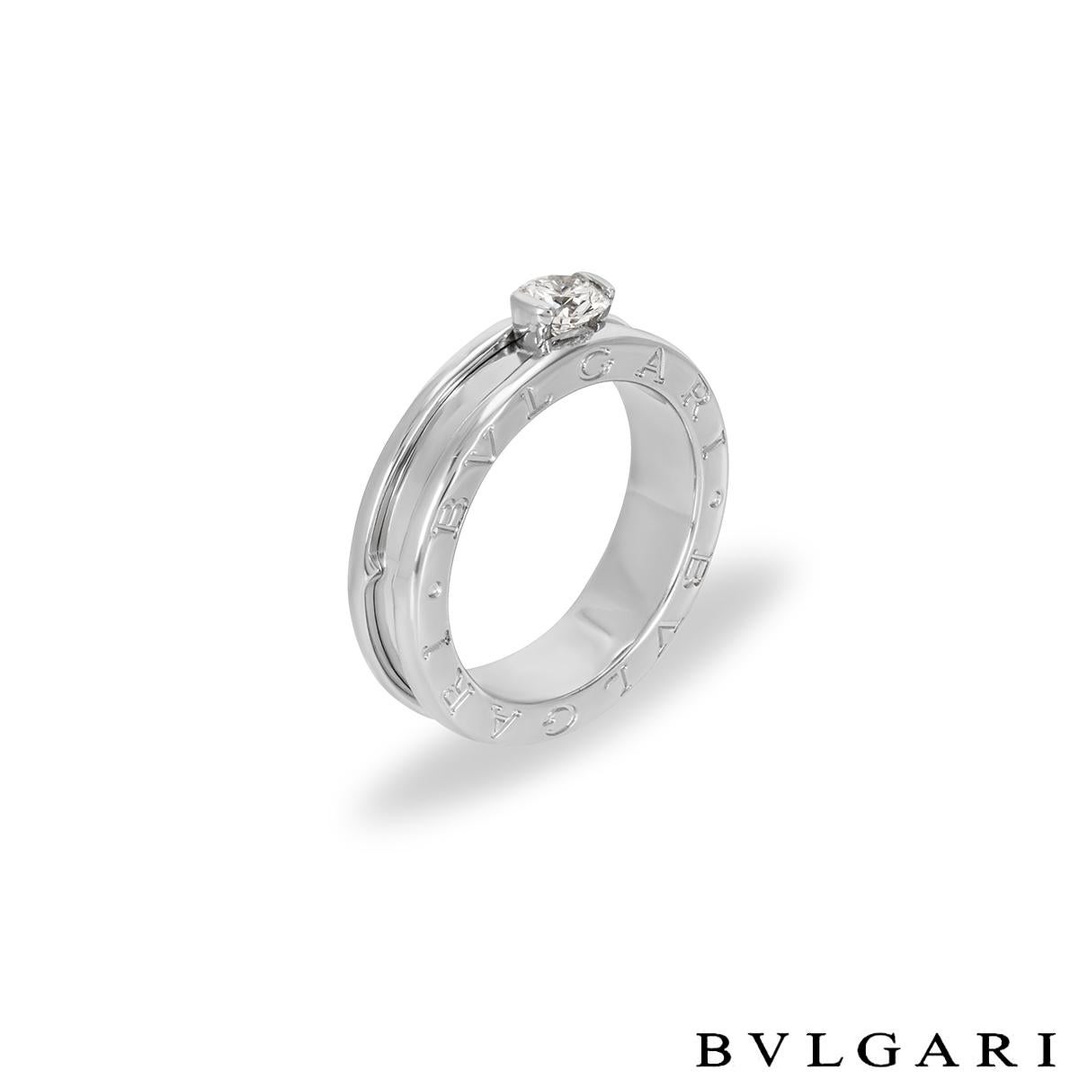 An 18k white gold diamond set Bvlgari ring from the B.Zero1 collection. Set to the centre of the ring is a 0.35ct round brilliant cut diamond in a rubover setting, F colour and VS1 clarity.  The ring is further complemented with the signature