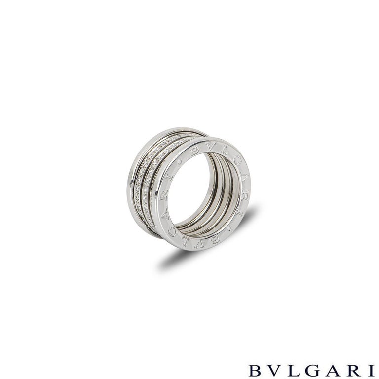 An intricate 18k white gold diamond ring by Bvlgari from the B.zero1 collection. The ring is composed of signature spirals pave set with round brilliant cut diamonds with an approximate weight of 0.80ct. The ring is further complemented with the