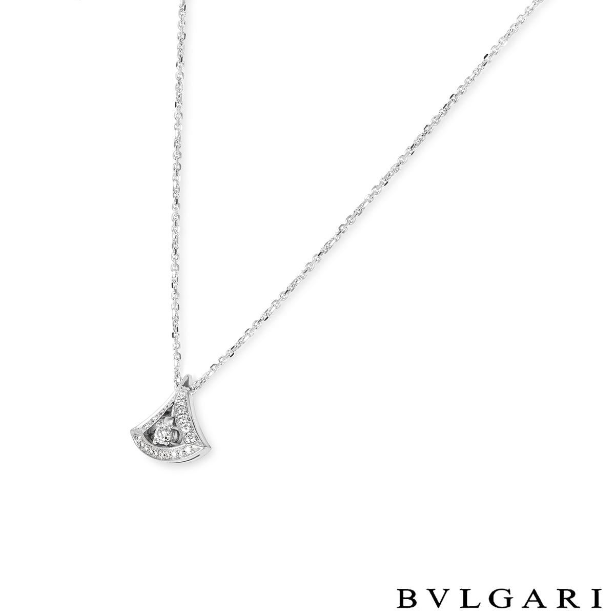 An elegant 18k white gold diamond pendant by Bvlgari from the Divas' Dream collection.  Set to the centre of the pendant is a round brilliant cut diamond surrounded by a fan-shaped motif. Further complementing the centre diamond are 22 round