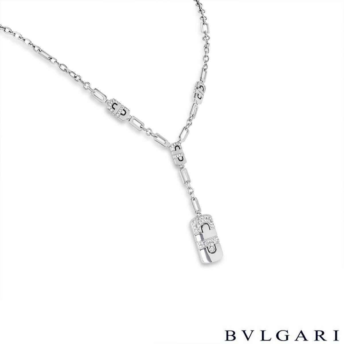 A beautiful 18k white gold diamond necklace by Bvlgari from the Parentesi collection. The necklace is in a lariat style with 1 large diamond set Parentesi pendant and 3 mini Parentesi diamond set stations. The 68 round brilliant cut diamonds pave