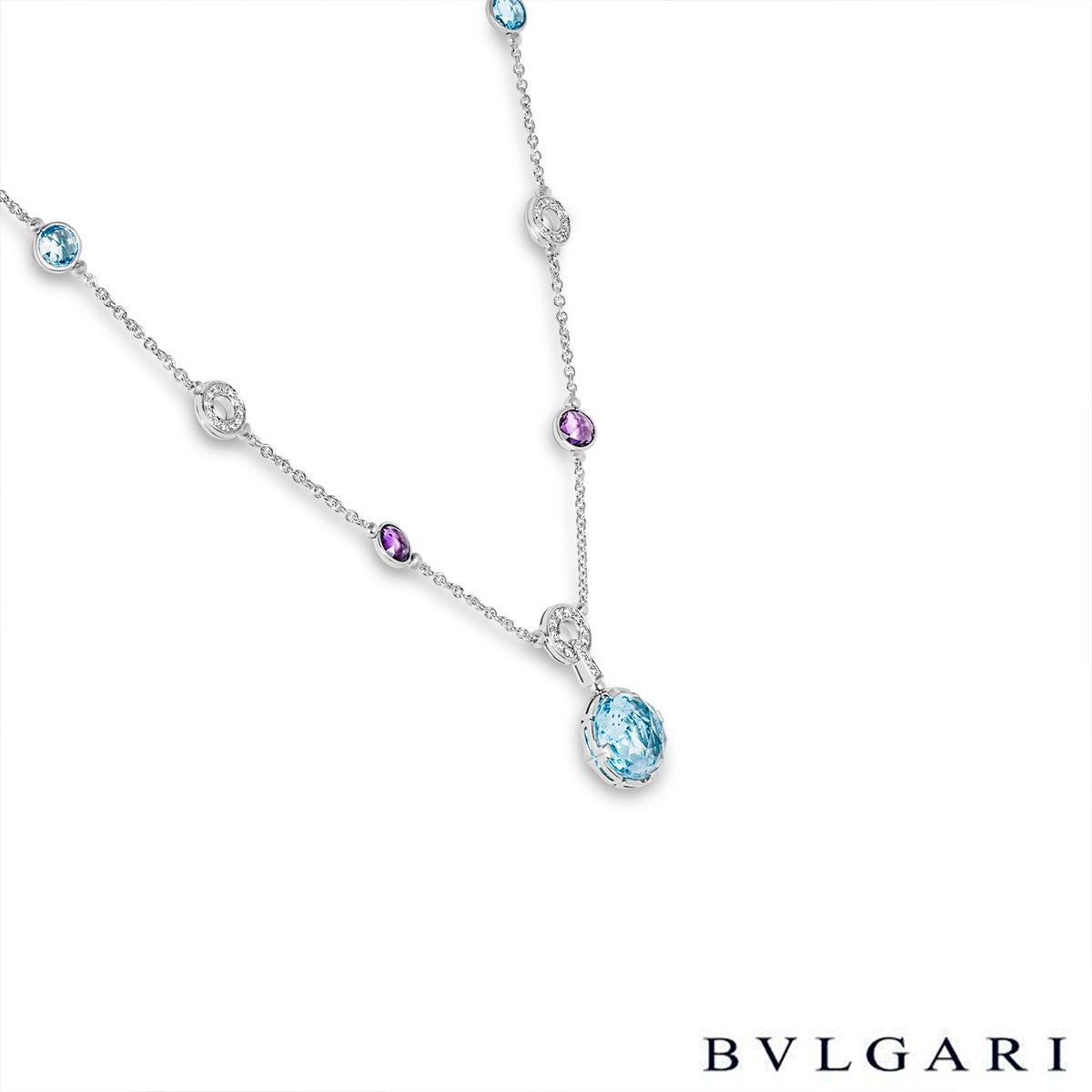An intriguing white gold multi-gemstone and diamond necklace by Bvlgari from the Parantesi collection. The necklace centres on a rose cut topaz suspended from a diamond set bail and Parantesi motif. Further up the necklace are 2 rose cut amethysts,