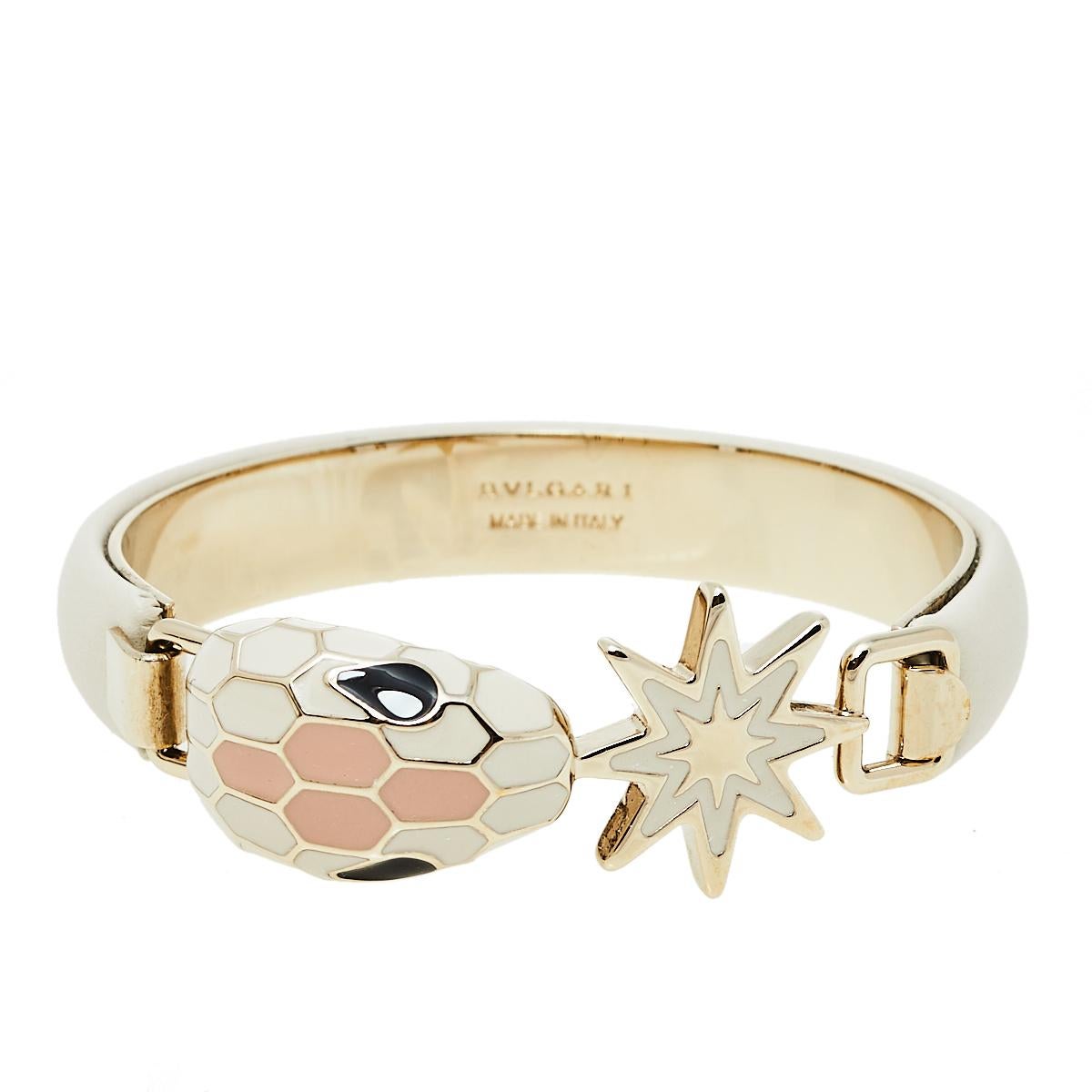 This iconic Bvlgari Serpenti Forever bracelet is from the brand's Holiday Capsule collection, 2019. It is finely crafted in leather and gold-plated metal and features the signature snake head along with a festive star charm, both coated with enamel.