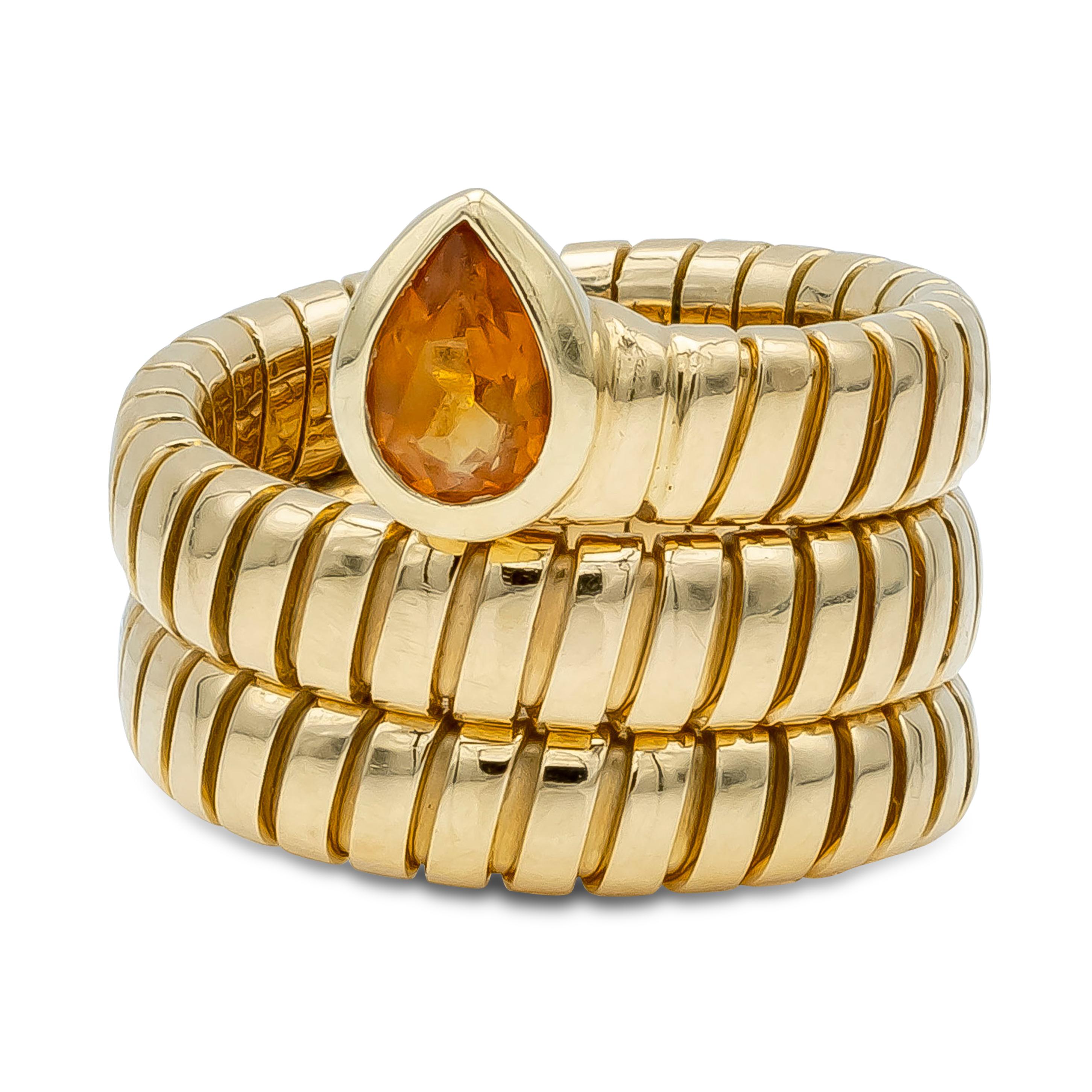 An Iconic Ring from Bvlgari design feature 3 Coil Tubagas Serpenti Ring with a Pear-shape Orange Citrine weighing 1 carat total. Made with 18K Yellow Gold, Size 6 US Stretch.
Made and Signed by Bvlgari