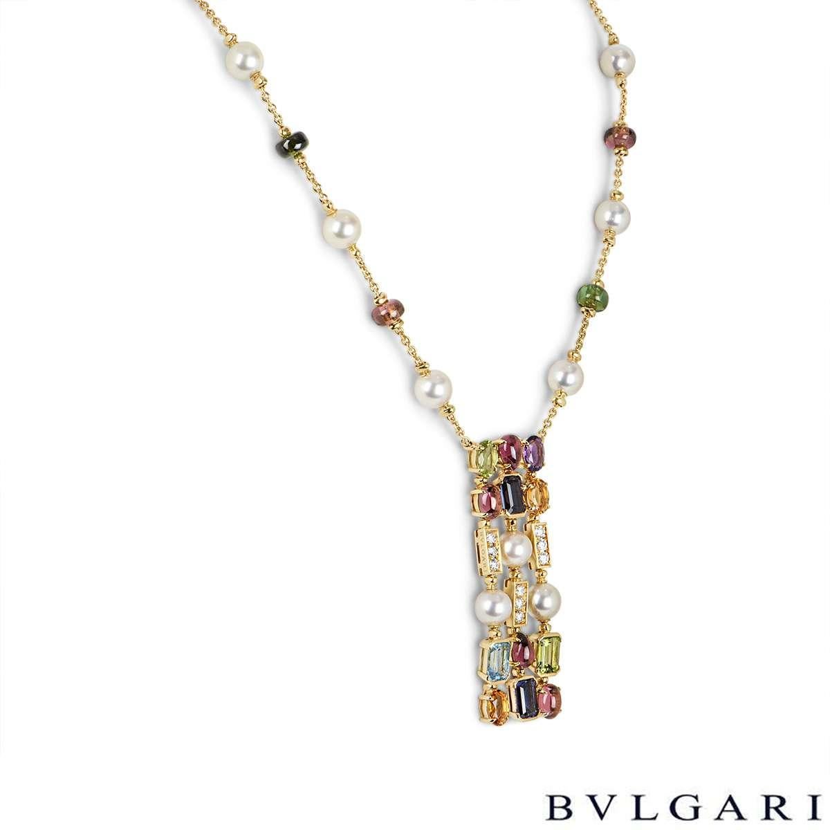 A beautiful 18k yellow gold necklace from the Allegra collection by Bvlgari. The necklace is set with round brilliant cut diamonds, pearls and a mixture of fancy cut gemstones. The gemstones consist of tourmaline, peridot, citrine, topaz, amethyst