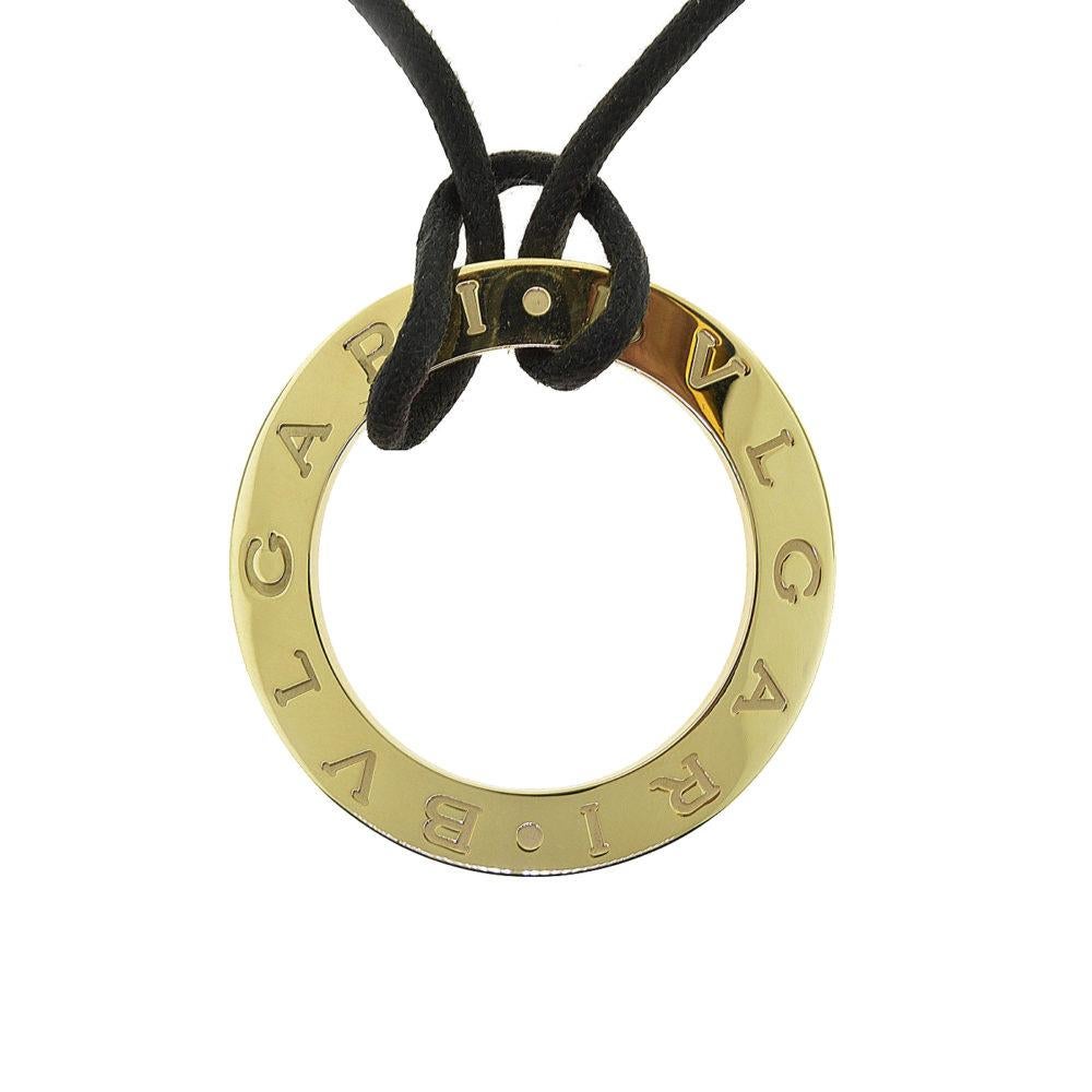 Bvlgari Yellow Gold Round Open with Black Silk Cord Necklace In Good Condition In Miami, FL
