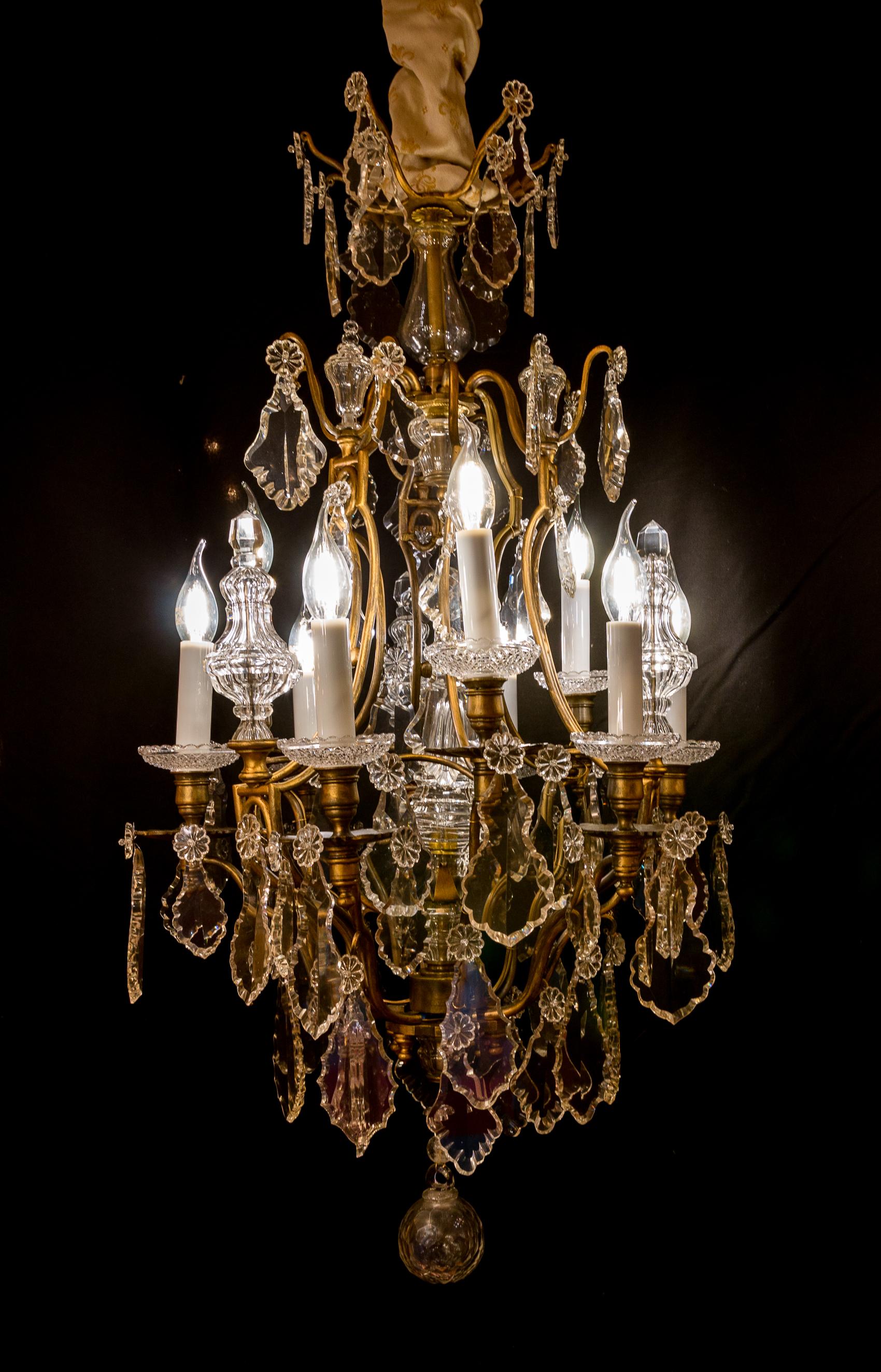 By The Cristalleries de Baccarat, French Louis XV style, gilt-bronze and cut-crystal chandelier, circa 1910-1920.

A beautiful gilt-bronze and hand cut-crystal, chandelier in the classic Louis XV style.
Our chandelier is composed of nine
