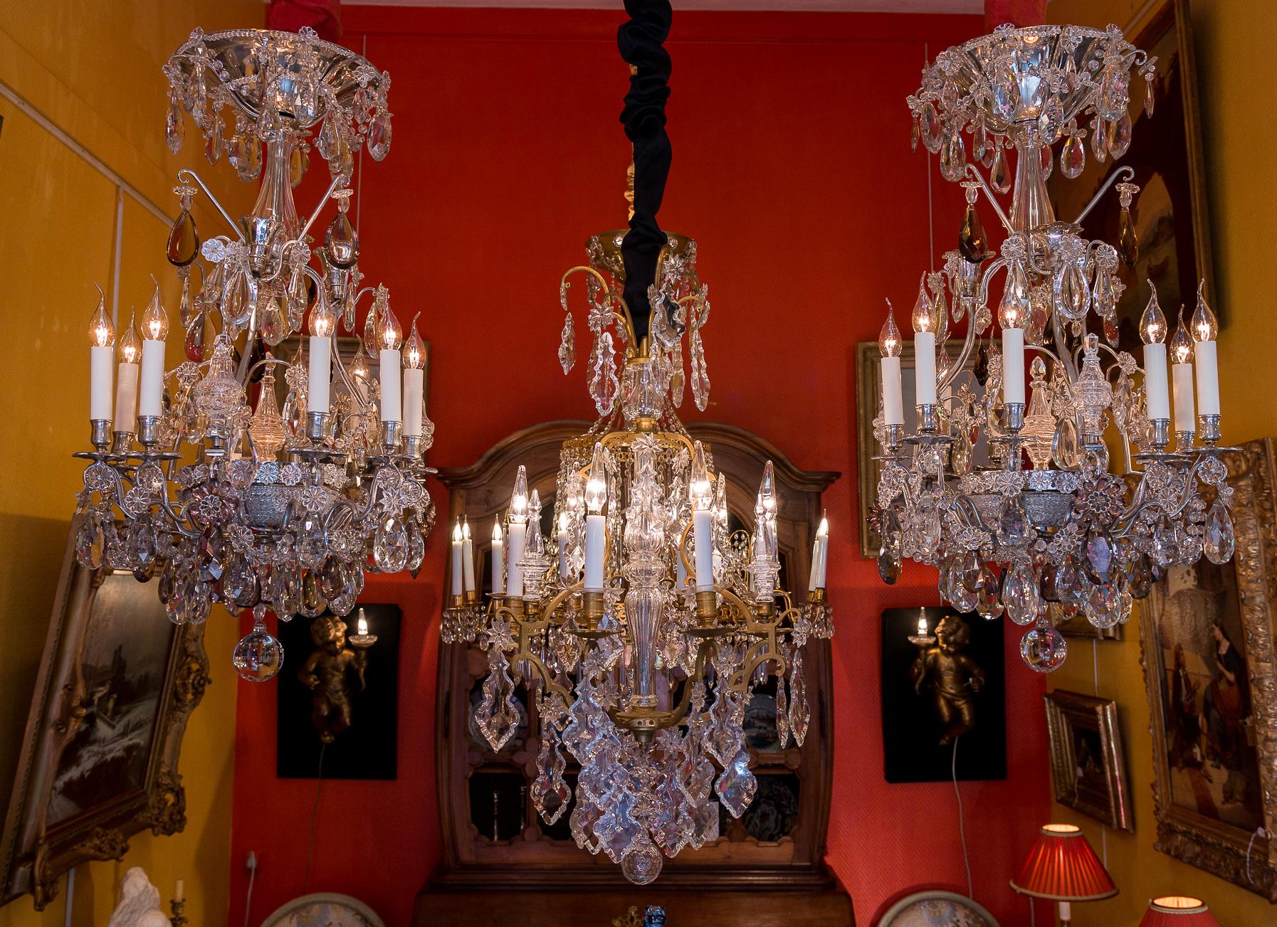 French pair of silver plate and cut crystal chandeliers, attributed to Baguès & Baccarat for the crystals, circa 1880

Amazing, rare, elegant and ornamental silver plate pair of French chandeliers with nine elegantly scrolled arm lights and six