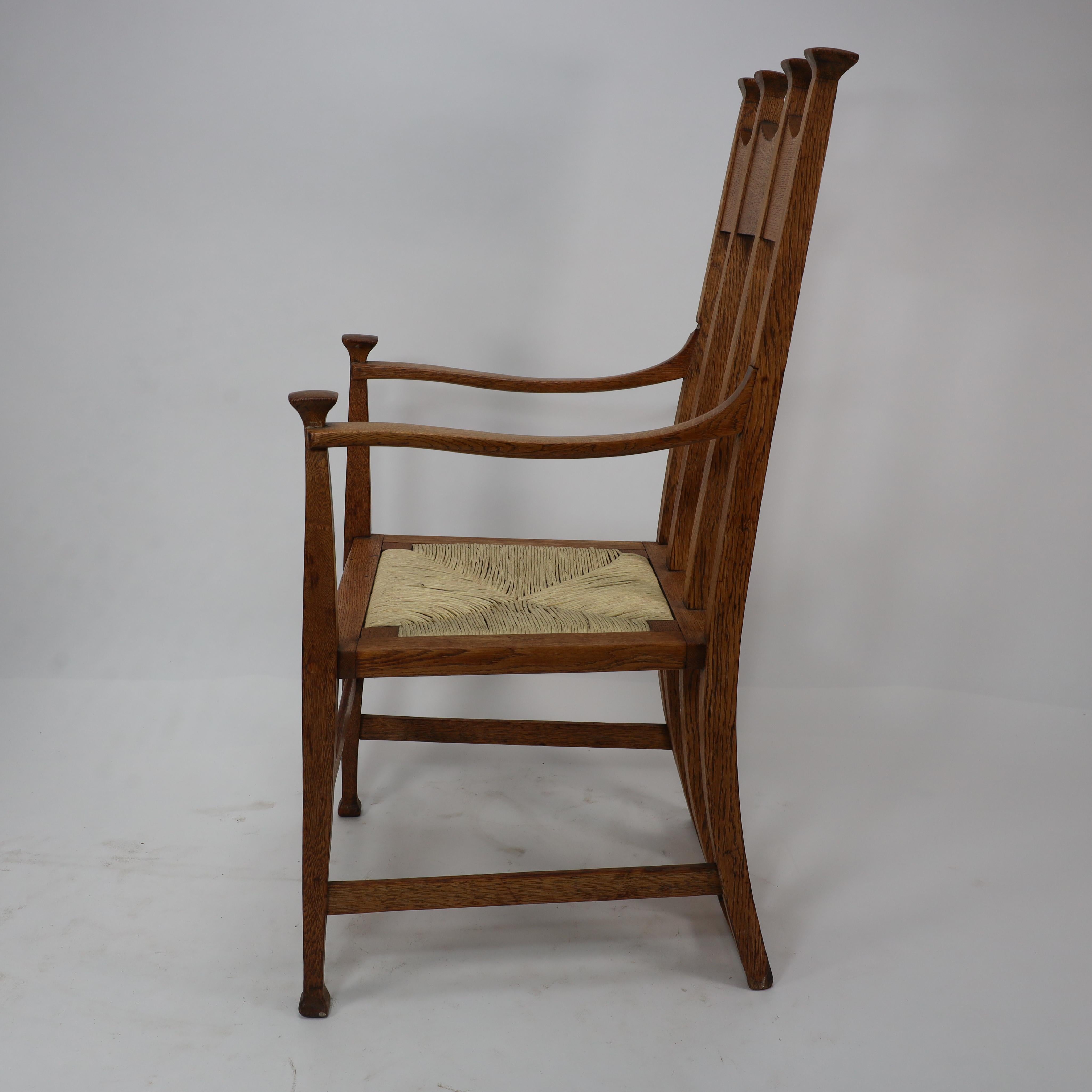English J S Henry Arts & Crafts oak dining chair with throne like caps & a sweeping back For Sale