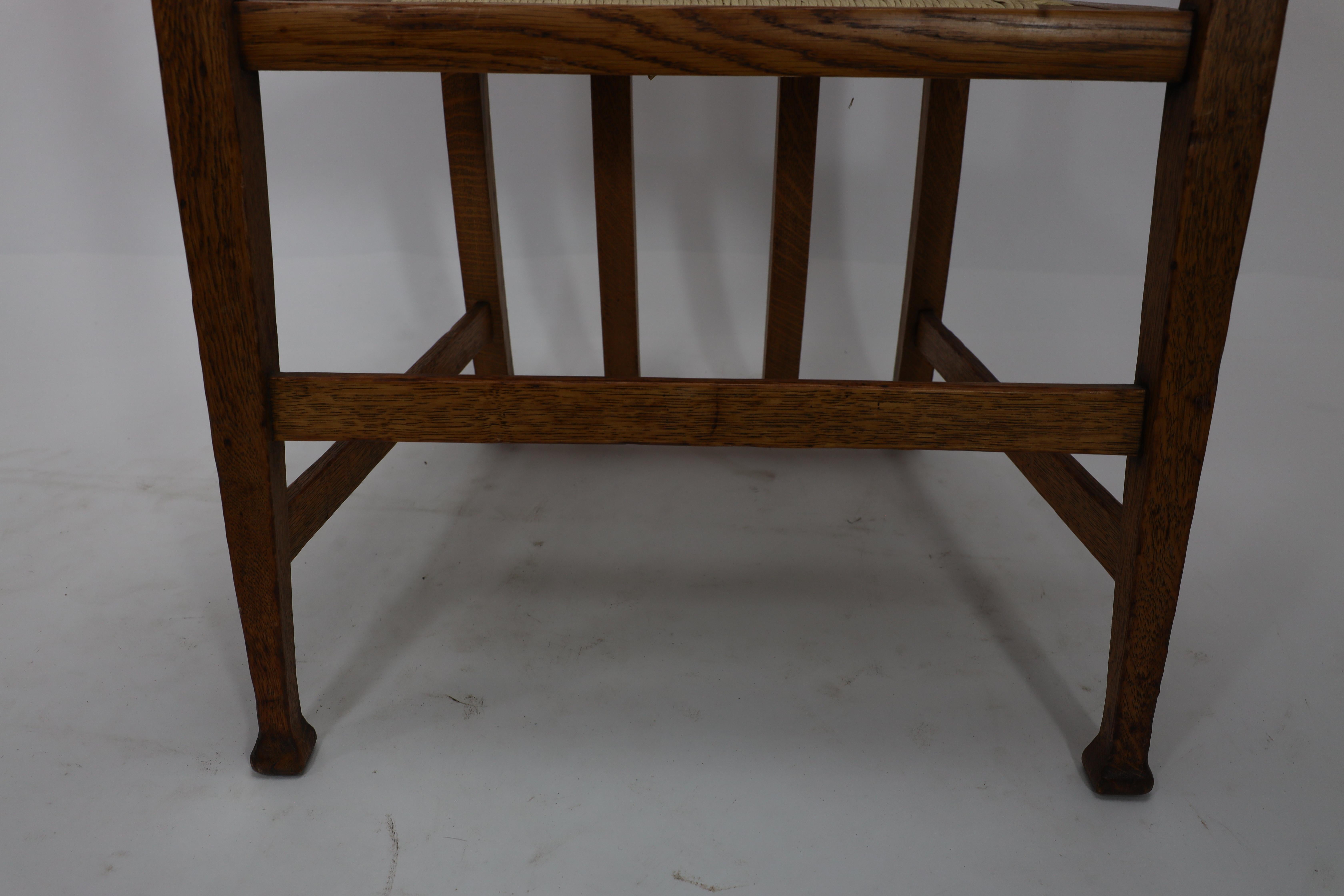 J S Henry Arts & Crafts oak dining chair with throne like caps & a sweeping back For Sale 3