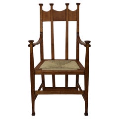 J S Henry Arts & Crafts oak dining chair with throne like caps & a sweeping back