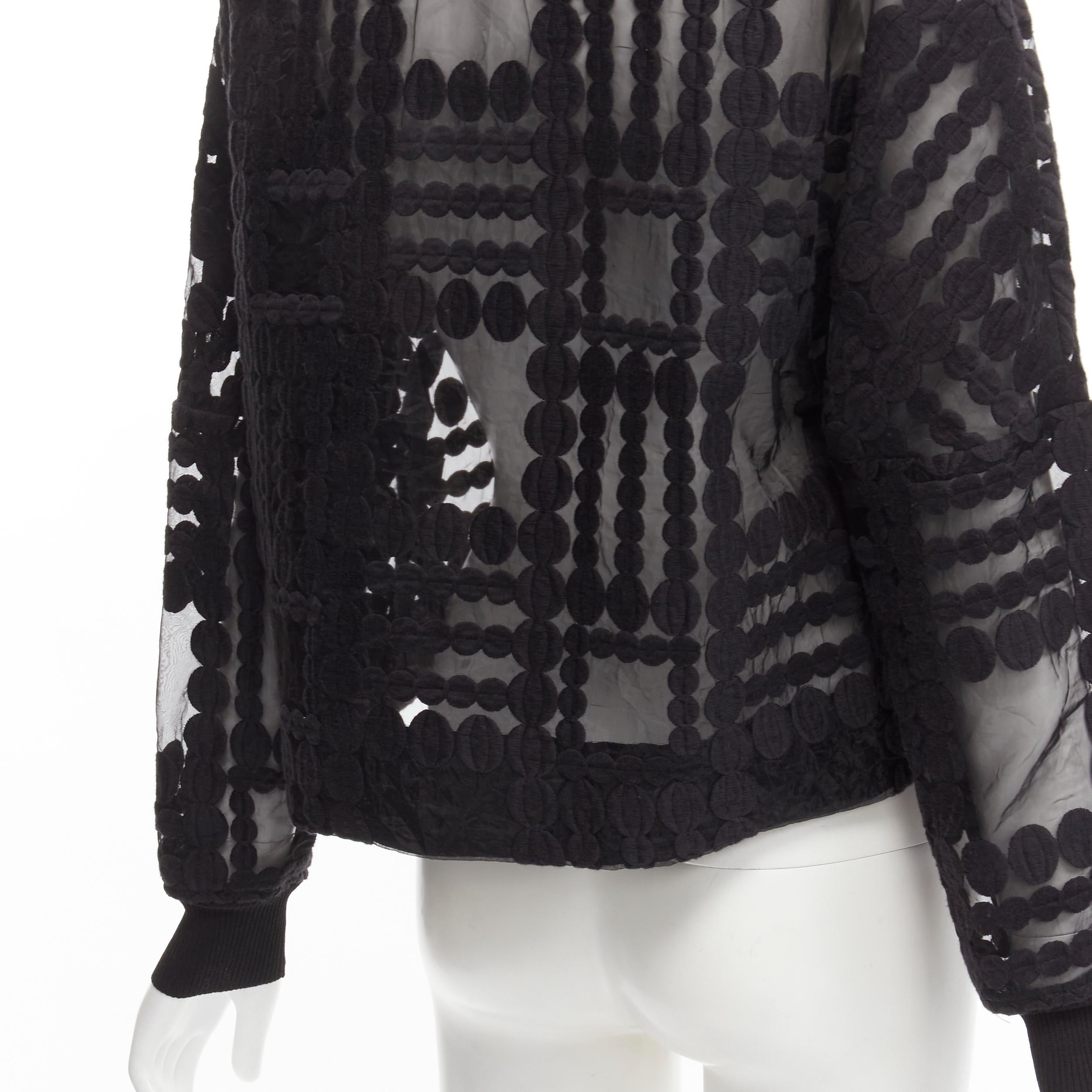 BY MALENE BIRGER black graphic circle embroidery sheer cropped sweater FR36 S
Reference: YNWG/A00146
Brand: Malene Birger
Material: Polyamide
Color: Black
Pattern: Solid
Closure: Pullover
Extra Details: Black rib cuffs.
Made in: