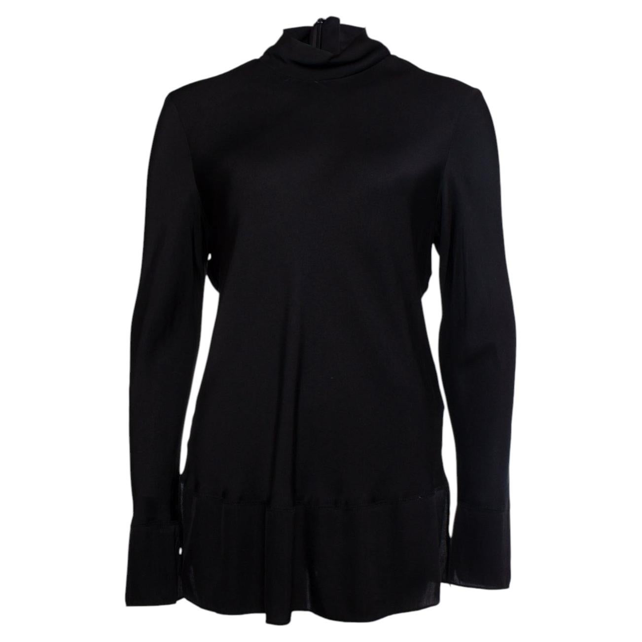 By Malene Birger, blusa con cuello alto en venta