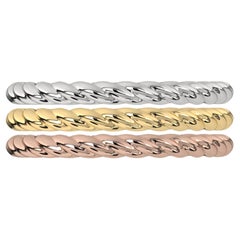 SU ORDINAZIONE: Anello a fascia ritorta in oro bianco 18 carati, oro giallo e oro rosa