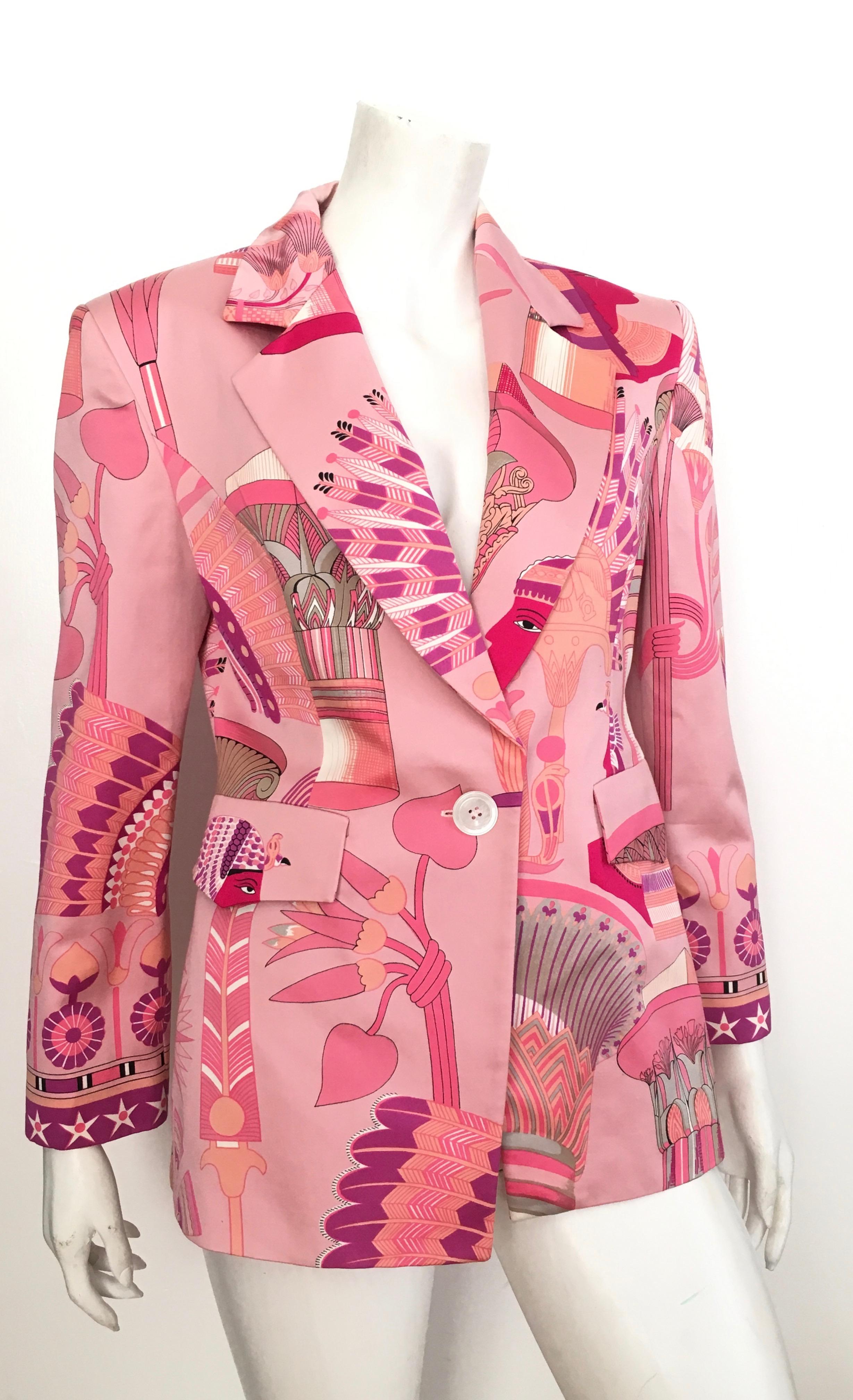 Byblos 1990s cotton with the most fabulous Egyptian print jacket size 8.  
Italian size 44.
Made in Italy.
This gorgeous cotton jacket with various shades of pink is just stunning.
Talk about turning heads when you wear this anywhere......
Wear this