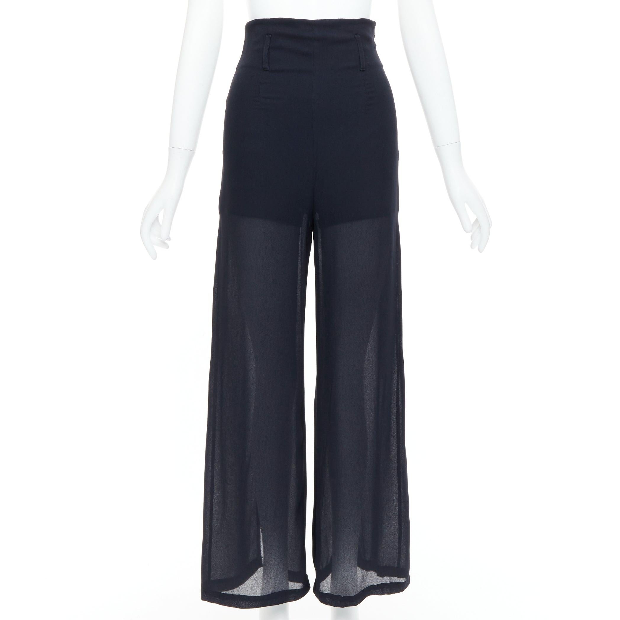 BYBLOS Vintage  black viscose back slit split sheer wide leg pants IT38 XS
Reference: TGAS/E00231
Brand: Byblos
Material: Viscose
Color: Black
Pattern: Solid
Closure: Zip
Lining: Black Fabric
Extra Details: Side zip. Back high slits that flows when
