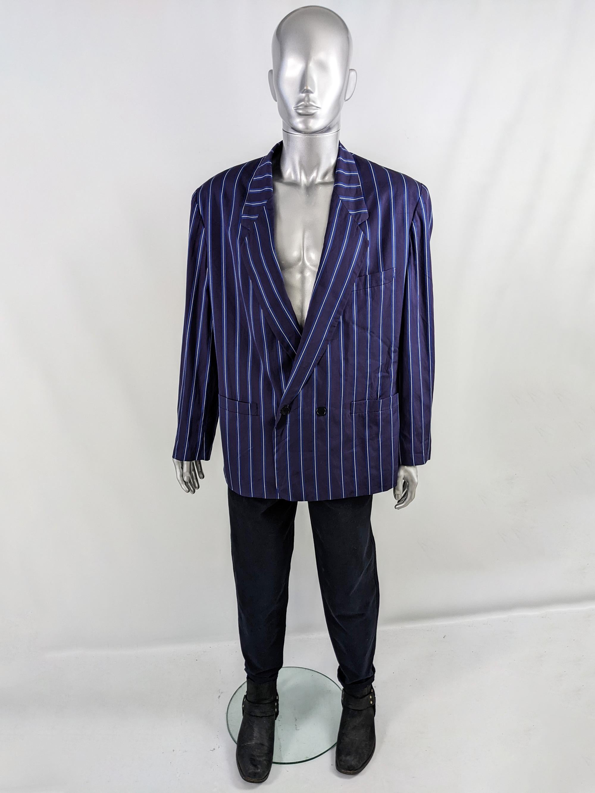 An excellent vintage mens boating style blazer from the 80s by luxury Italian fashion house, Byblos (who Gianni Versace was once a creative director of). In a dark purple fabric with a blue and white vertical regatta stripe throughout. It has