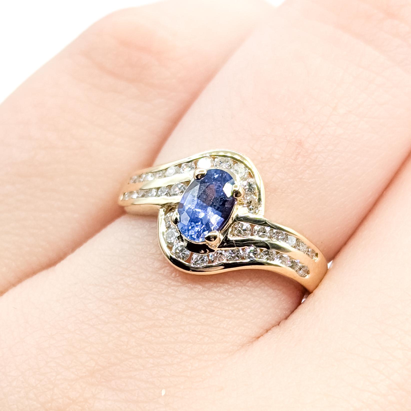 Bague en or jaune 14k avec diamant bypass et saphir bleu Excellent état - En vente à Bloomington, MN