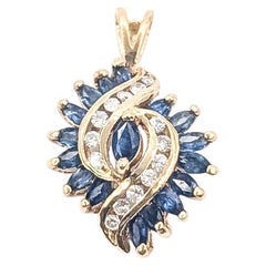 Ciondolo con zaffiro e diamante bypass in oro giallo 14k