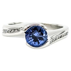 Anello con zaffiro e diamante bypass in platino