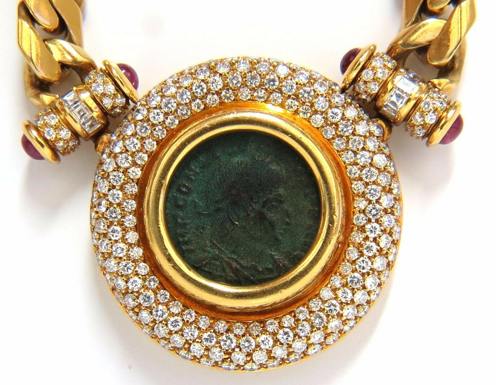 6.00ct Natural Diamonds & Ancient Coin Cuban Link Necklace 
Full cut brilliant Round diamonds. 
Vs-1  Clarity. 
F/G-color.
.50ct natural Cabochon Red Rubies.
18kt. yellow gold / 15.25 inches (wearable Length)
98.6 grams.
Coin Frame Diameter: 1.4
